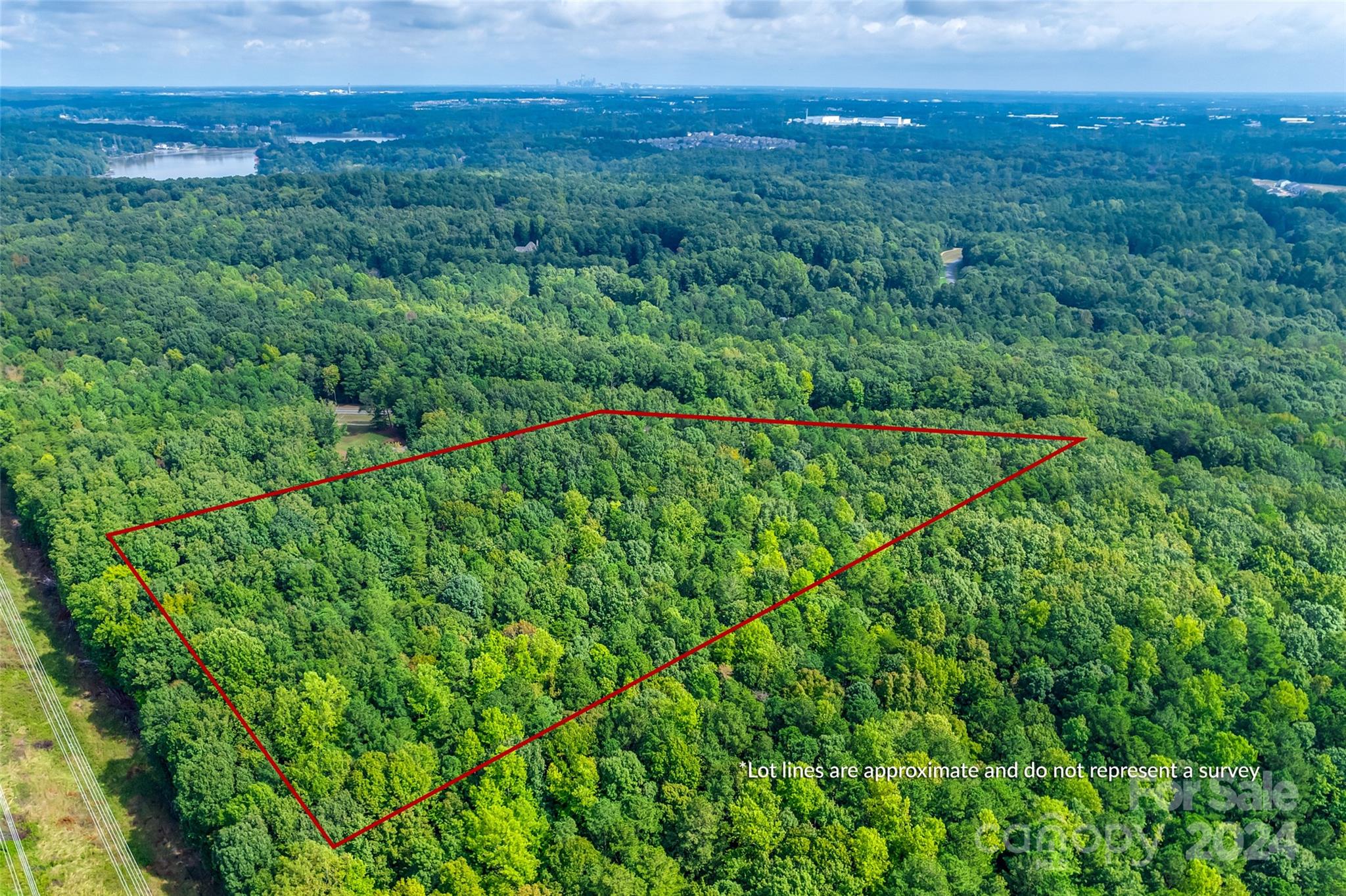 Welcome to an exceptional opportunity in The Sanctuary. This wooded 4.65-acre vacant lot offers a serene, private setting, perfect for building your dream home. The level terrain makes it easy to design and construct your custom residence. The Sanctuary is known for its upscale amenities, including a resident lodge, fitness center, tennis courts, Lake Wylie access, and miles of scenic walking trails. Most homes in this neighborhood exceed $1 million, ensuring a refined, luxurious atmosphere. Despite the peaceful seclusion, you are minutes from all the conveniences you need— grocery and retail stores, dining, and more. Charlotte Douglas International Airport is less than a 30-minute drive, making travel a breeze. This lot combines privacy, prestige, and accessibility—an unbeatable blend for your future estate. Don't miss the chance to join one of the area's most sought-after communities! *See MLS 4195386 for inspiration build*