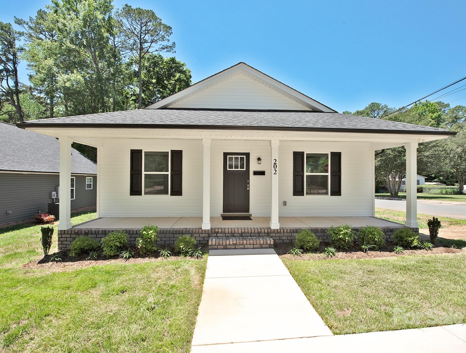 New construction! The kitchen features custom-built cabinets with Shaker doors, granite countertops in the kitchen & baths. Nice baseboards and trimmed-out windows. LVP Plank Vinyl flooring at Great Room, Dining, Kitchen, Breakfast, Laundry, all baths; carpet in bedrooms. Stainless steel appliances inc. Dishwasher, microwave, and smooth top range. Many upgrades for this price point, custom finishes. Ready to Move-in. Minutes from downtown China Grove & major highways.