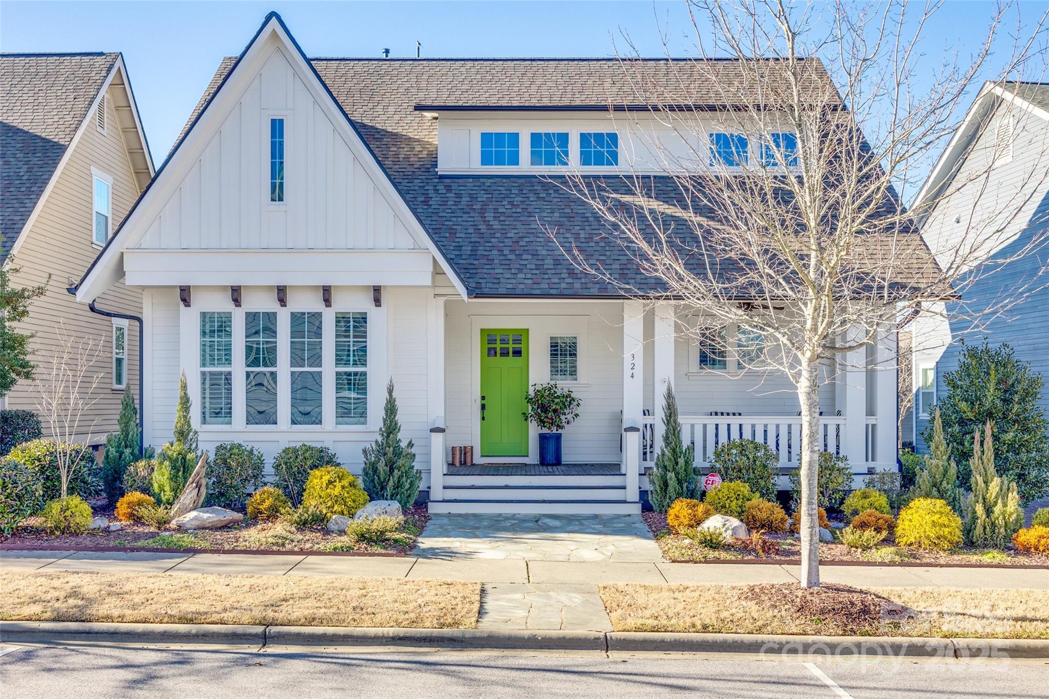 Welcome to this amazing Saussy Burbank home in Riverwalk. The open concept living space is great for entertaining & is loaded with upgrades galore including custom built-ins in the living room & upstairs hallway, shiplap throughout, gorgeous light fixtures, marble tile gas fireplace, walkout attic storage. The kitchen showcases top-of-the line white cabinetry, oversized Carrara marble island & quartz on the perimeter counters, white tile backsplash, & SS appliances. Owner's suite on main includes soaking tub, walk in shower, & marble tile floors. Two of the bedrooms upstairs include private bathrooms with tile tub surrounds & flooring.  The 4th bedroom/flex features beautiful barn doors. Plantation shutters & site-finished hardwood floors on main floor, 10’ ceilings with 8’ doors downstairs and 9’ ceilings upstairs & security system. Backyard features screened in porch, patio, wood privacy fence, 2.5 car garage, & adjacent parking pad.