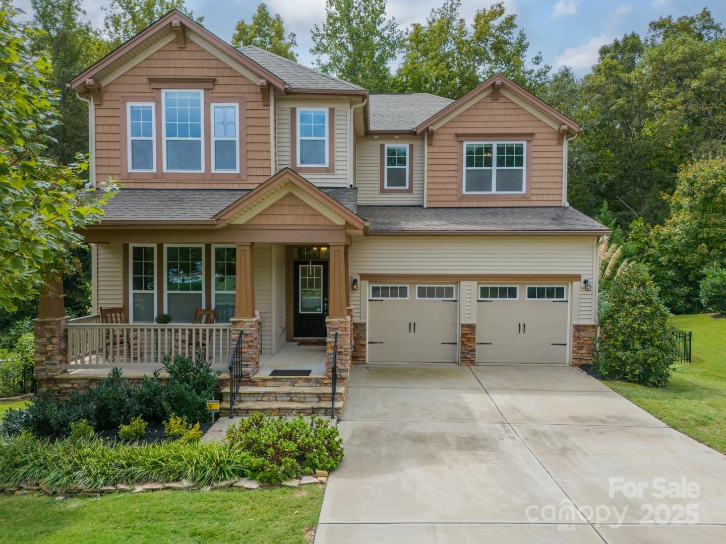 Stunning 2-sty/Basement home priced to sell! 4100+ HLA w/many many upgrades. On lower level, visit the 1,313sf newly-finished WALK-OUT BASEMENT with full living area which includes expansive Rec Rm, Flex Rm/BR5, Full BA w/seamless glass shower door, & this amazing 2nd Kitchen: island bar w/custom cabinets, soft-close drawers, wine fridge, full fridge, DW, microwave & cooktop! On main step into beautiful engineered wood floors w/Foyer leading to Office & formal DR. Going further find open concept living: Gourmet Kitchen w/center island, gas cooktop & dbl wall ovens; Brkfast area & LR w/gas fp. Step out to state-of-the-art 728sf Trex/Steel Deck w/airline cables; stairs lead to oversized shaded patio below. Prewired for hot tub! On upper level you'll find Primary BR w/lux Bath & walk-in closet, Guest BR w/en-suite BA + 2 more BRs, Full Bath & spacious Loft! Upgraded lighting throughout. Fenced backyard, community pool & playground + nearby restaurants, shopping & conveniences! Indian Land Schools.