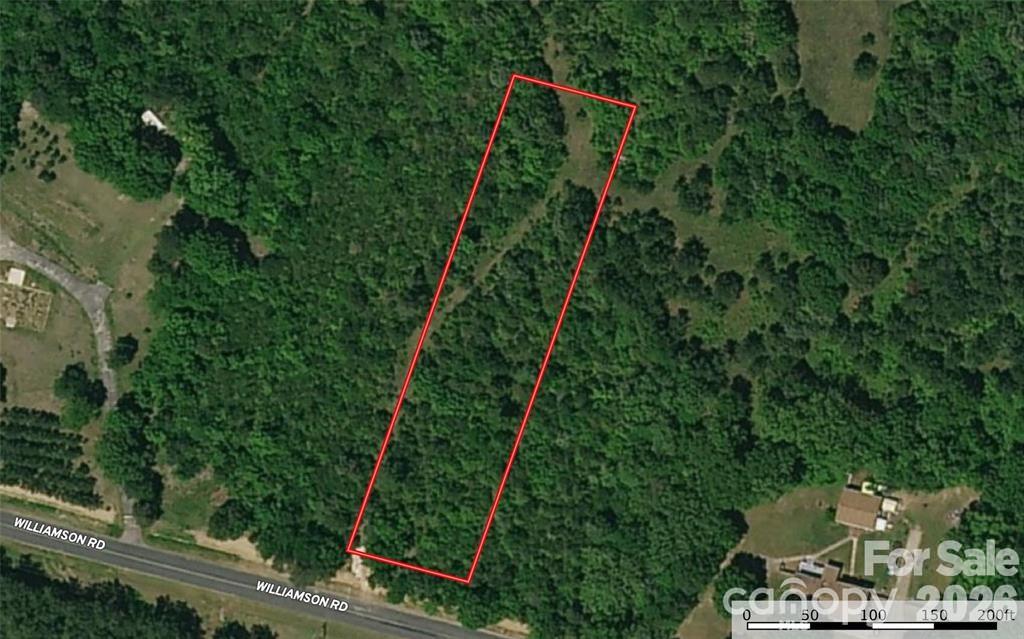Large wooded lot in York County, SC. This 1 acre lot is less than 10 minutes from Rock Hill & I-77. Lot is level and wooded with large trees providing privacy and abundant wildlife. Located off a quiet country road outside of Rock Hill city limits (no city taxes paid) and less than 30 minutes from Charlotte, NC - maybe 45 minutes to Charlotte Douglas Airport....;-). Lot requires well & septic. Contact Listing Agents for more information! A deal this good for an acre of land this close to everything will not last long!!! Call Today!!