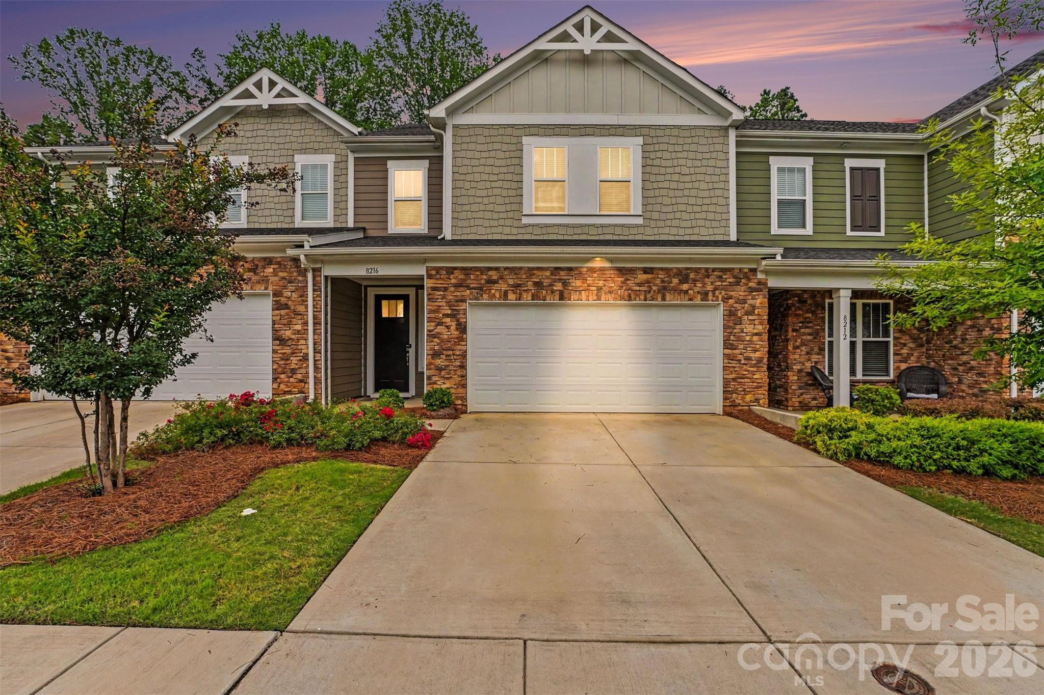 Welcome to this beautifully maintained 3 bedroom, 2.5 bathroom townhome located in the desirable Redwood Rookery section of The Vineyards on Lake Wylie. Designed for both comfort and convenience, this home features an an open concept layout, spacious living areas, and a two-car garage, offering the perfect balance of style and functionality. The kitchen flows seamlessly into the dining and living spaces, creating an ideal setting for entertaining or everyday living. Upstairs, you'll find three generously sized bedrooms, including a relaxing primary suite with a private bath and ample closet space. Step outside to your private backyard retreat featuring low maintenance turf, providing year-round greenery and the perfect space for pets, play, or outdoor relaxation without the upkeep.

As a resident of The Vineyards, you'll enjoy access to brand new resort-style amenity center which includes 2 pools, a fitness center, and clubhouse. Other community amenities include a kayak launch, boat ramp to Lake Wylie, walking trails, tennis courts, pickleball courts, bocce ball, playgrounds, and dog parks. 

Conveniently located near shopping (Premium Outlets), dining, Charlotte Douglas International Airport (7 Minutes), Downtown Belmont (8 Minutes), River District (10 Minutes) and Uptown Charlotte (20 Minutes), this townhome offers an exceptional lifestyle in one of the area's most sought-after communities.