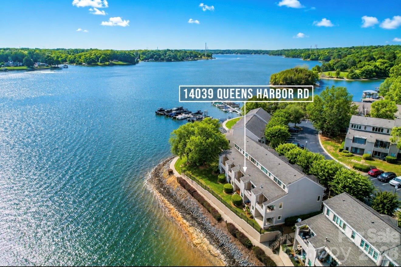 Experience exceptional waterfront living in the highly sought-after gated community of The Yachtsman on Lake Wylie. Perfectly positioned to capture breathtaking panoramic water views and unforgettable sunsets, this beautifully remodeled waterfront townhome offers a rare opportunity to enjoy resort-style lake living at its finest.

This spacious residence features three bedrooms, each with its own private en-suite bath, plus a convenient main-level half bath. The home showcases a stunning modern chef’s kitchen featuring porcelain countertops, custom open shelving, a built-in wine cabinet, beverage refrigerator, gas cooktop, stainless steel appliances, and premium finishes throughout. Top of the line whole-house water softener and Water heater installed in 2022, Furnace 2024. 

Retreat to the private outdoor spaces where you can relax in the Signature Platinum six-person hot tub spa, entertain guests, or simply take in the tranquil waterfront setting. 

The community amenities include a private waterfront beach, boat slips & storage, lake access, walking trails, tennis courts, scenic ponds, a resort-style waterfront pool, and clubhouse. 

A rare opportunity to own a completely remodeled waterfront home with extraordinary Lake Wylie views, modern luxury finishes, and premier resort-style amenities in one of the lake’s most desirable gated communities.