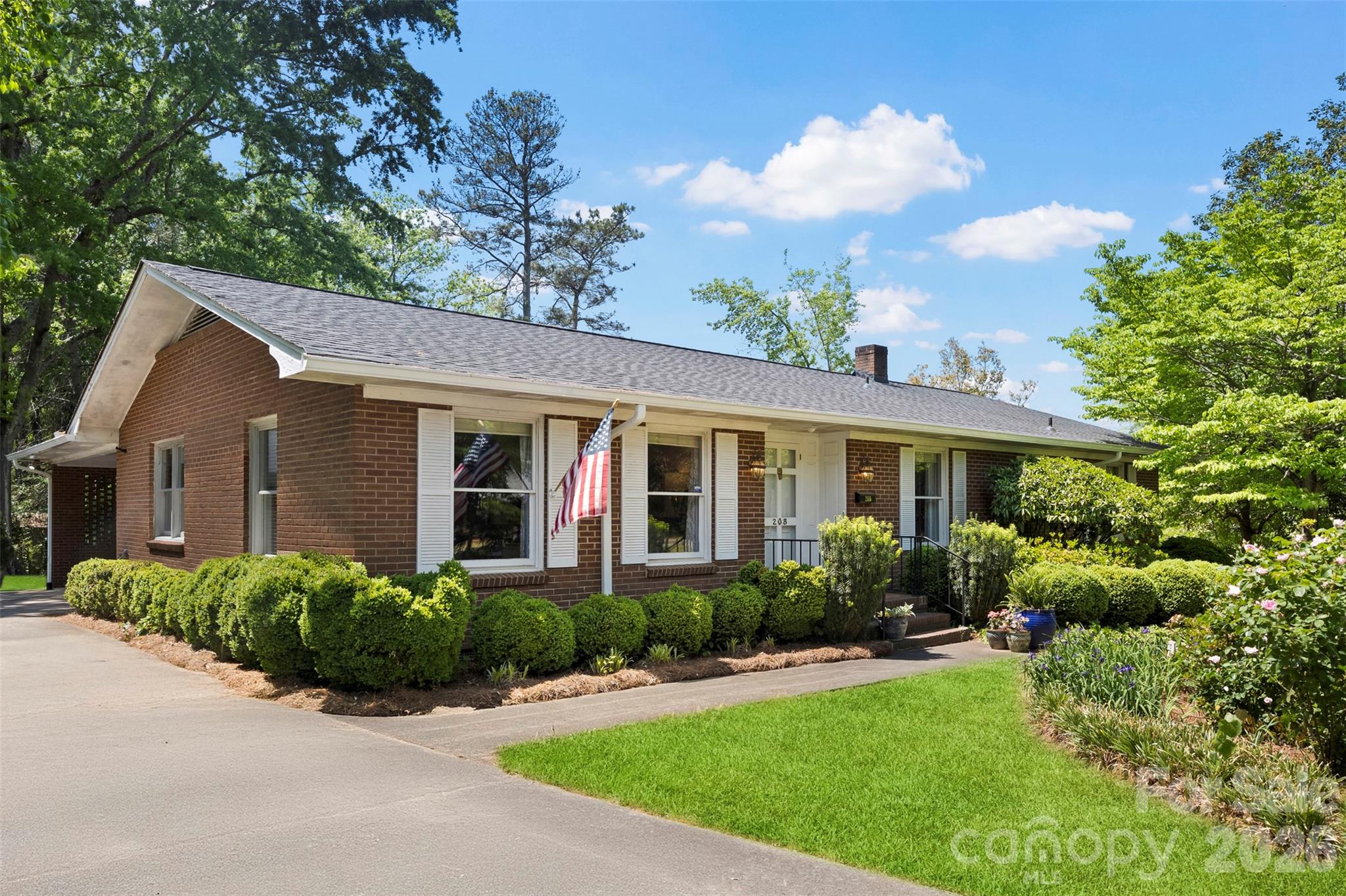 Located in the heart of Cherryville, this stately brick home seamlessly blends timeless charm with thoughtful updates, all nestled in a quiet, well-established neighborhood. Featuring 3 bedrooms, 2.5 bathrooms, and a finished basement, this home offers ample space for living, working, and entertaining. The main level boasts both a formal living room and a cozy family room with gas logs, creating the perfect balance of elegance and comfort. The formal dining room is a true showstopper, highlighted by beautiful wallpaper and a statement chandelier—perfectly embodying the sought-after grand millennial style. The kitchen is equipped with stainless steel appliances and opens to a charming breakfast area with built-in seating, ideal for casual mornings or gathering with family. The primary suite features an updated bathroom, while two additional bedrooms share a convenient Jack-and-Jill layout. Crown molding throughout portions of the main living areas adds an extra layer of sophistication. The finished basement adds valuable flex space and includes a convenient half bath, enhancing functionality for guests or entertaining. Step outside to enjoy the covered patio and terrace just off the family room, perfect for entertaining or relaxing evenings at home. Recent updates, including a new roof, gutters, and gutter guards in 2025, provide added peace of mind. A home full of character, space, and modern updates, all in a desirable Cherryville location.