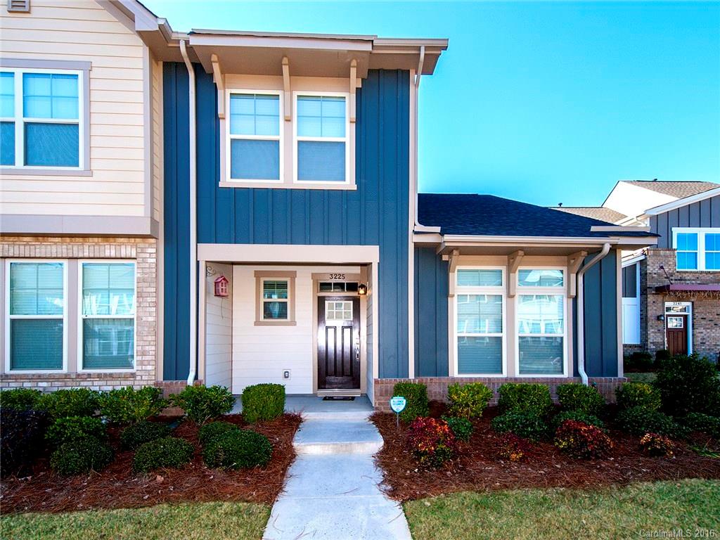 This three bedroom, 2.5 bath end unit townhome near Uptown Charlotte has everything you're looking for in a new home.  Gorgeous kitchen with granite countertops, upgraded cabinets and stainless appliances. Solid surface flooring throughout the living area of downstairs.  Two story living room with a ceiling fan you have to experience to believe.  Large, main floor master suite with tiled bathroom and walk in closet.  Upstairs has 2 more bedroom, 2 full baths and loft area for den or office.