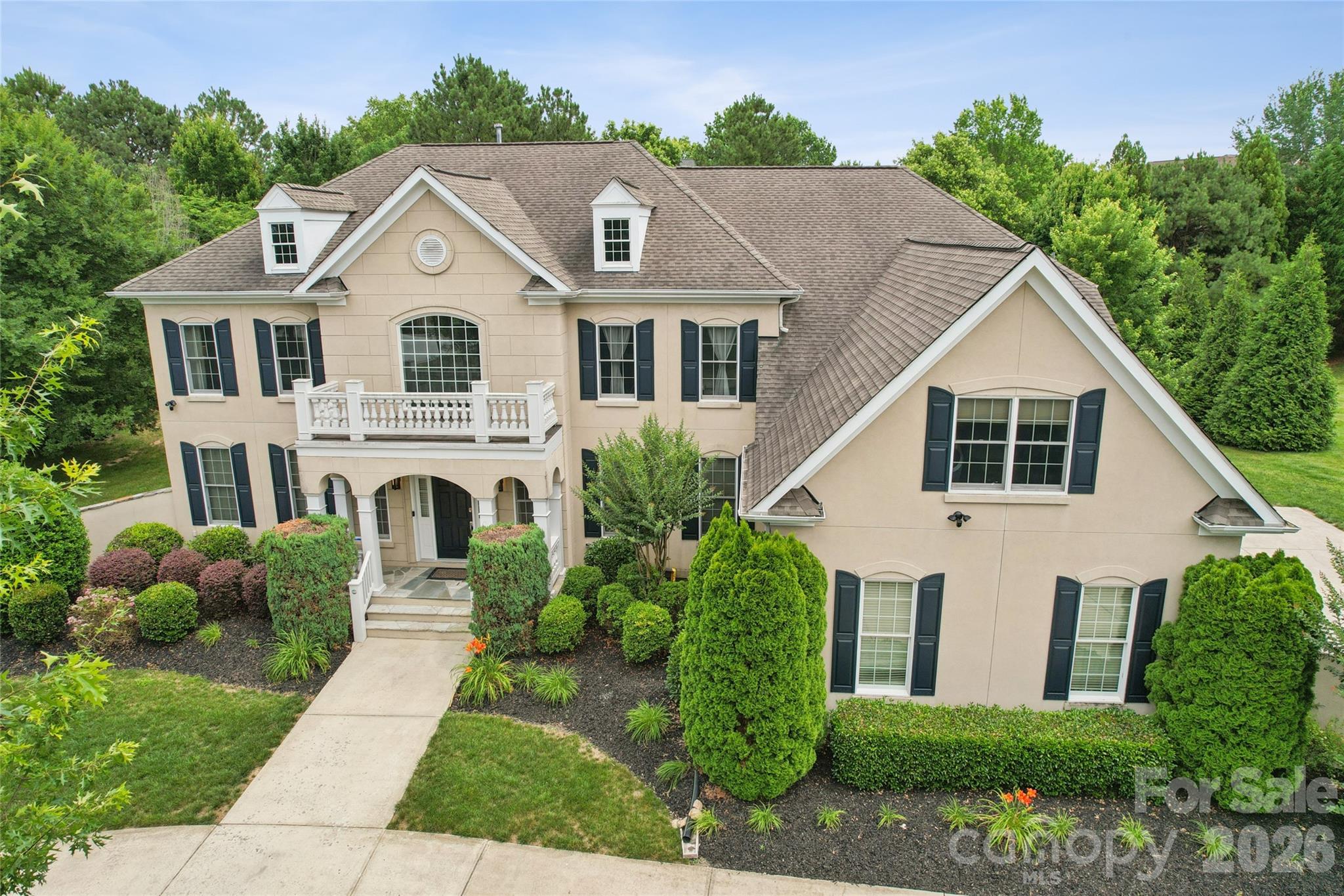 Beautifully appointed estate home in the highly sought-after Marvin Creek community, offering exceptional space, luxury finishes, and outstanding indoor/outdoor entertaining. A dramatic two-story foyer welcomes you with an elegant double staircase and abundant natural light.
The expansive chef’s kitchen is designed for both everyday living and entertaining, featuring a commercial-grade gas range, additional wall oven, built-in refrigerator, oversized walk-in pantry, and generous prep space. The kitchen flows seamlessly to a beautiful outdoor patio overlooking the private, landscaped backyard with irrigation system.
Upstairs, every bedroom includes its own private en-suite bath, providing comfort and privacy for family and guests alike. The luxurious primary suite offers three oversized closets, a private sitting area currently used as a personal gym, and a spacious spa-like retreat feel.
The fully finished basement with exterior entrance is an entertainer’s dream, complete with a large recreation area, pool table space, and a private home theater. Additional highlights include a circular driveway, 3-car garage, and meticulously maintained grounds.
Ideally located and zoned for the highly desirable Marvin Elementary School district, this exceptional home combines elegance, functionality, and resort-style living in one of the area’s premier neighborhoods.