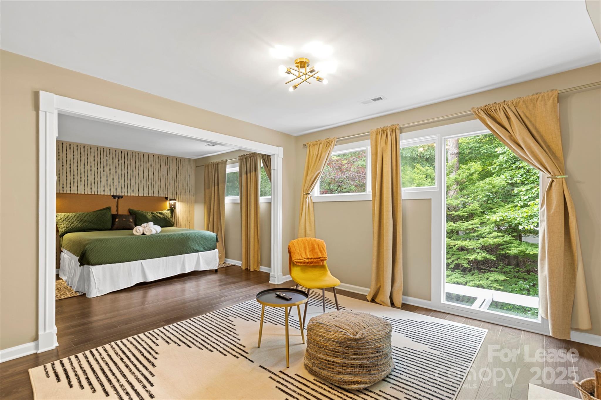 Relax and reset in this suburban furnished 2-bedroom townhome among the trees. This renovated luxurious spa-like retreat is located within walking distance to the golf course, marina, and lake. Enjoy access to community amenities including a swimming pool and tennis courts during your stay. Fall in love with the cute and bright ambiance that complements newer furnishings and fixtures found throughout this lovely Fort Mill home. A rich list of modern amenities spreads across both floors, touched with charming neutral colors, LVP floors and an abundance of warm sunlight bursting through large windows. This open plan with a kitchen island is perfect for entertaining. The upper floor is reserved for two relaxation oases and a large updated bathroom designed and furnished with maximum comfort and convenience in mind. Enjoy the tranquility of this enchanting neighborhood on the private front & back porches. 3-month minimum Rental availability: July 5 –Dec. 30. Utilities and internet included