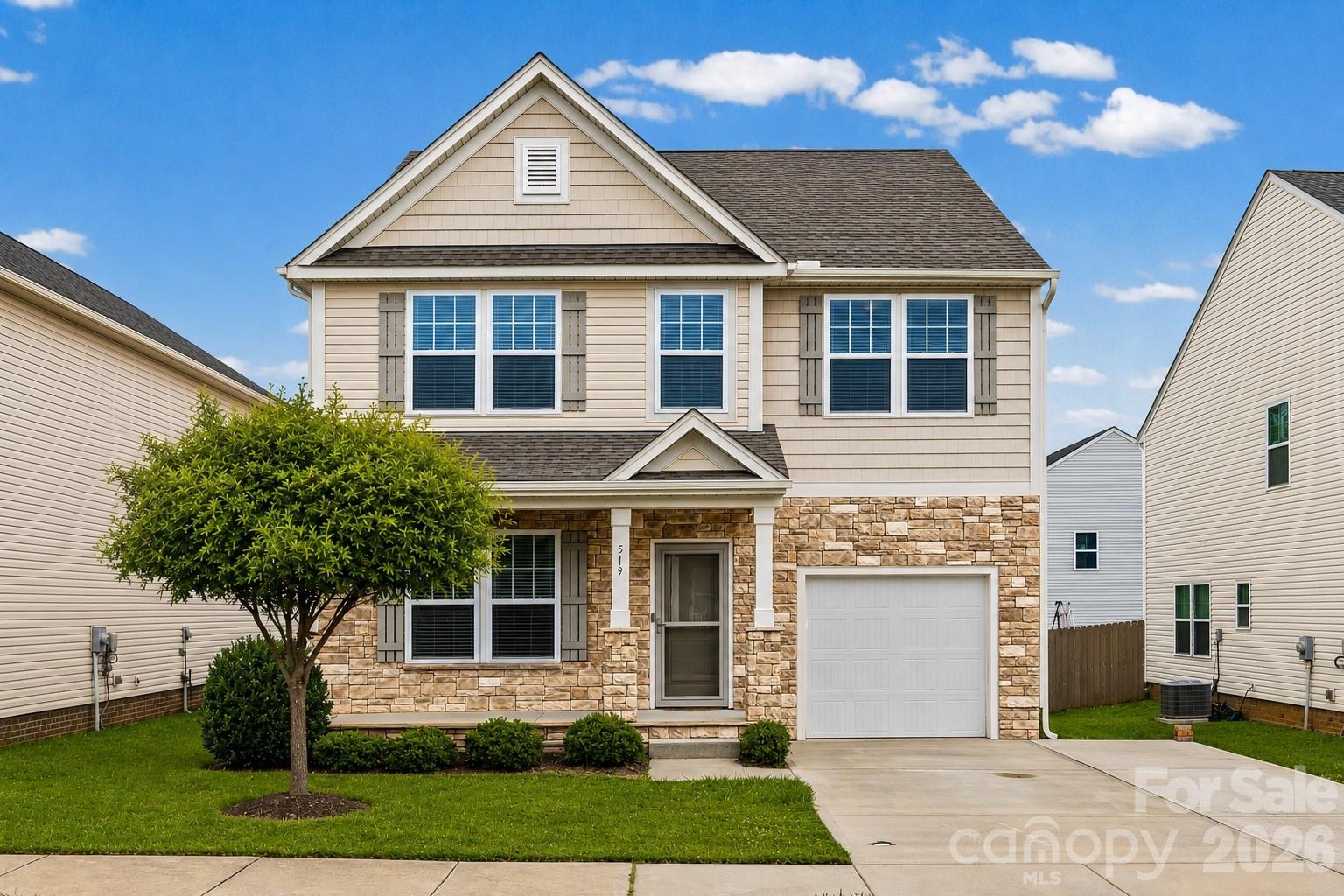 Design your ideal Charlotte-area lifestyle in this exceptionally functional, 2,241-square-foot two-story residence located in Rock Hill's desirable Roddey Park neighborhood. Positioned perfectly for effortless commutes straight up I-77 into Uptown Charlotte, this property offers unmatched layout versatility that is incredibly rare for the region. The main level anchors a seamless, open-concept design where a spacious kitchen, built for easy meal prep and hosting, directly overlooks the main living area and backyard. Uniquely engineered for the modern professional, this floor features two separate, dedicated rooms that serve as the ultimate dual remote-work setup, allowing two people to work from home simultaneously with complete privacy.

Upstairs, the footprint expands into a large secondary family room, creating a distinct second zone for entertainment or a media lounge completely tucked away from the main living areas. Practical living is a priority here, evidenced by the secure, attached enclosed garage offering excellent storage. The property culminates in the highly coveted flat backyard, which is fully fenced and features a concrete patio perfectly positioned for weekend grilling, outdoor dining entertaining. Whether you are headed out to explore local breweries in Old Town Rock Hill, hitting Knowledge Park, or enjoying a quick drive into the heart of Charlotte, this home delivers the ultimate blend of suburban space and convenience.