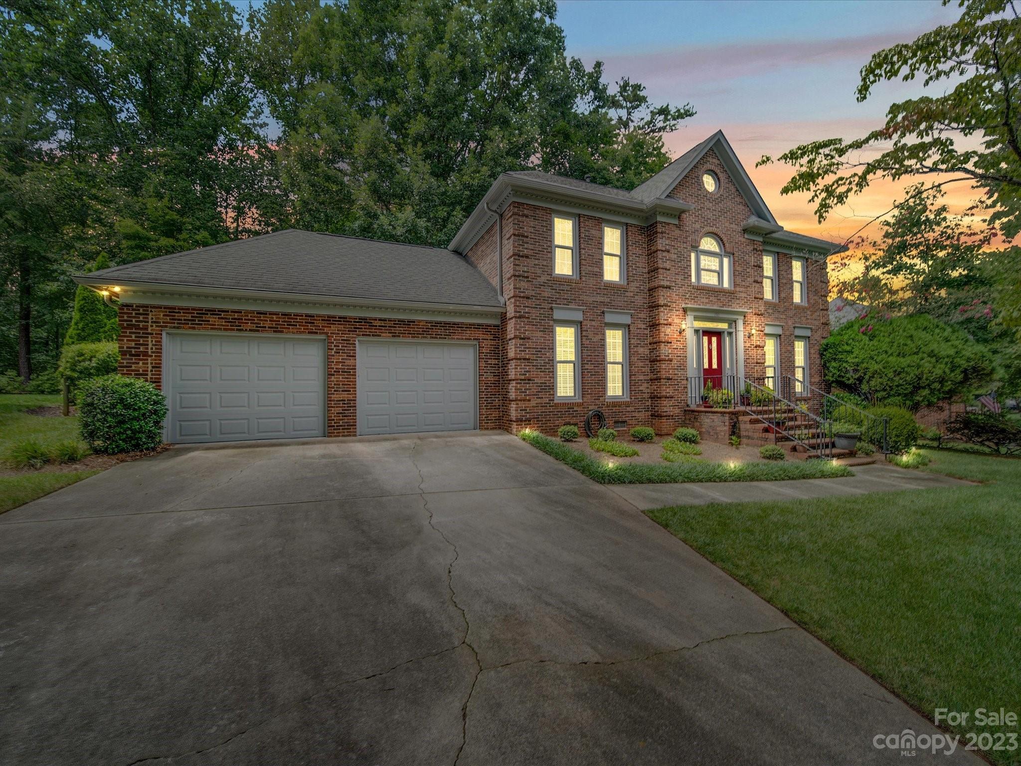 MULTIPLE OFFERS RECEIVED. OFFER DEADLINE OF FRIDAY, 8/11 at noon. Welcome home to this stunning brick home located in highly desirable Ashley Creek in Matthews. Enter the foyer to hardwood flooring throughout the main level. There are two living spaces, dining room and updated kitchen with eat in area and half bath on the main level. The great room boasts a gas fireplace and windows facing the serene backyard. The home has updated lighting throughout. The tastefully updated kitchen includes white cabinets, quartz countertops, tile backsplash and stainless appliances. The breakfast area leads to the oversized deck and outdoor gazebo providing an abundance of entertaining space. The second level offers four bedrooms and two baths. The primary suite offers an ensuite bathroom with dual vanity sink, soaking tub and luxury shower.  Neighborhood access to Squirrel Lake Park & Four Mile Creek Greenway to reach downtown Matthews with ease!