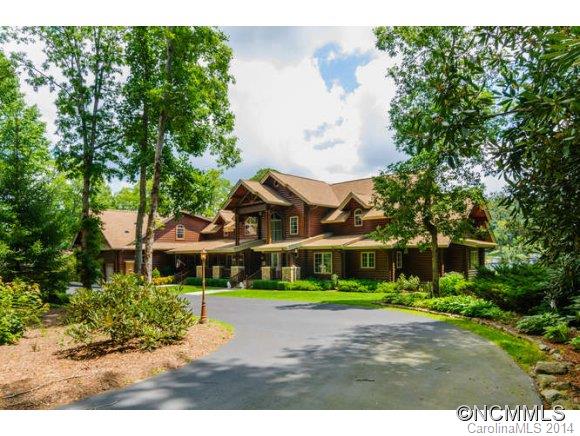 Magnificent Jim Barnum log home on two totally level lots. Paved circular driveway with stone columns and iron gates. Three car garage and 2 stall boat house w/ lifts. Home has 6,910 sq ft and a 30' vaulted living room ceiling. Magnificent log structure ideal for a large family and huge play space in both the front and back yards. Eastern exposure w/ expansive lake views. Outstanding fishing for 8 species of game fish including walleye. B-17/18