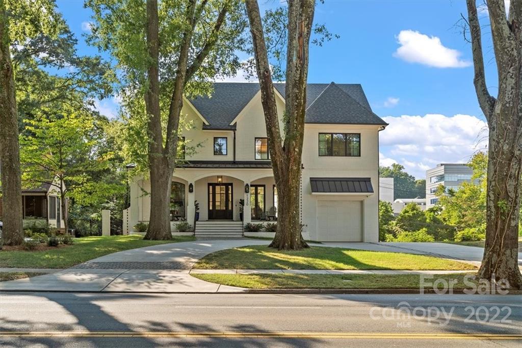 Stunning 3-story, brick home + basement in sought-after Myers Park featuring custom finishes & impressive details throughout! Open living & dining spaces framed with glass doors & filled with natural light adjoin gourmet kitchen with floor-to-ceiling cabinets, quartzite counters, high-end appliances, walk-in pantry & 8' window that opens onto expansive deck. Upstairs is spacious primary bedroom with 2 walk-in closets, and en-suite bath with heated floors, oversized steam shower & soaking tub. Two bedrooms with jack-and-jill bath, 4th bed/bonus & laundry room on 2nd. Third floor has loft space, bedroom & connected bath. Basement is ideal for guests with 2nd kitchen & bar, family/rec room, bedroom, bath & storage. Glass sliders lead onto covered back patio with heaters & fans to enjoy all year. Private, fenced-in backyard with low-maintenance turf, built-in seating & fire pit, plus heated lap pool & hot tub. Prime location near Greenway, Freedom Park, restaurants, shops, hospitals, etc.!