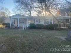 INVESTOR SPECIAL - This fixer-upper home is a diamond in the rough, waiting for the right buyer to transform it into a beautiful and functional living space. Located in a quiet neighborhood, the home boasts a large lot with mature trees and a spacious backyard, offering endless possibilities for outdoor activities and relaxation.