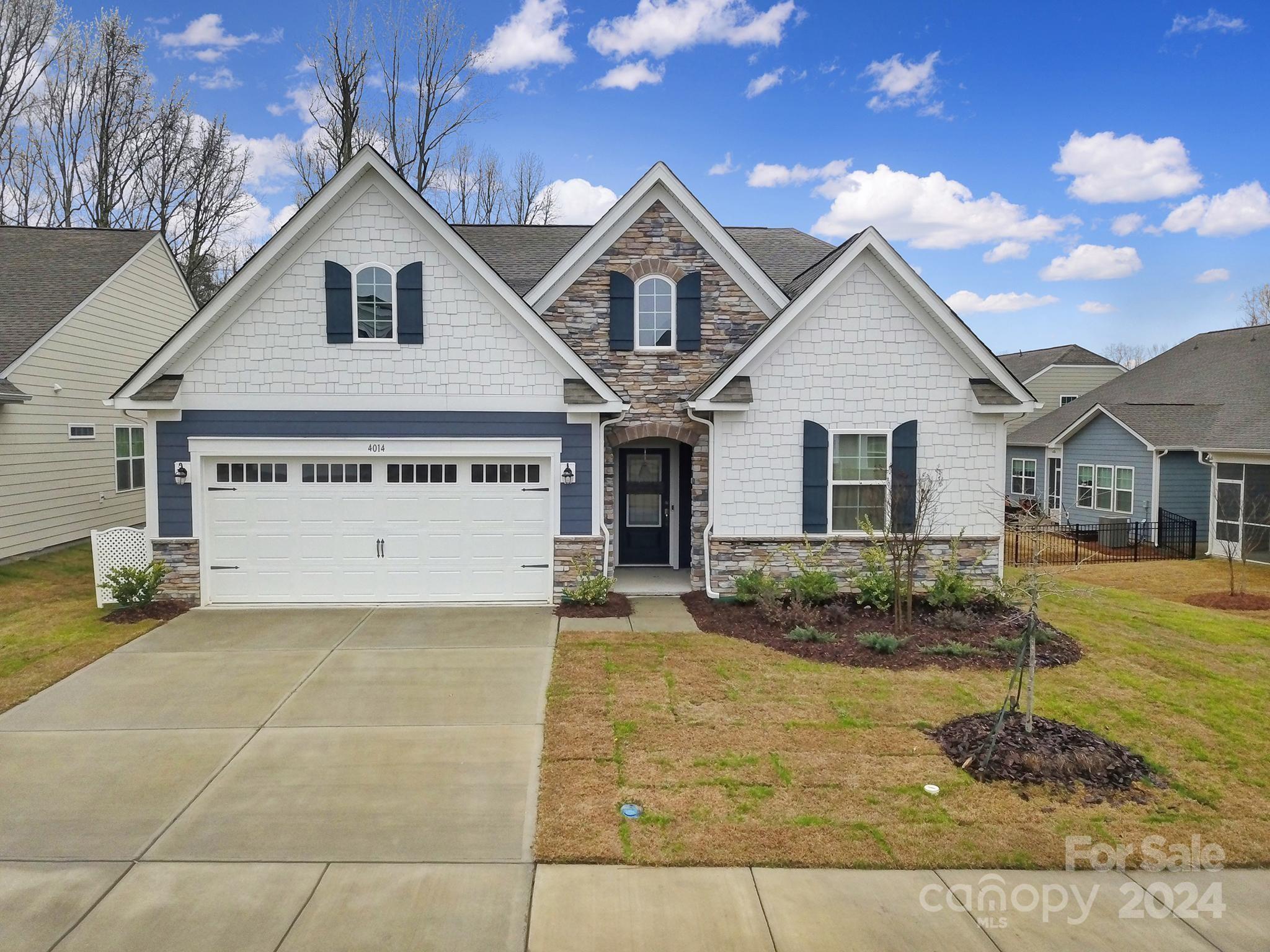 Location, Location, Location! Cozy Open Floorplan Home In Tega Cay's Windhaven Neighborhood. Enjoy Your Chef's Kitchen With Beautiful Quartz Countertops, Breakfast Island, Tile Backsplash, Gas Cooktop & SS/Appliances Which Is Open To The Spacious Casual Dining Area & Overlooks The Family Room. Primary Suite Features Walk-In Closet, Quartz Dual Sink Vanity, Tiled Shower & Linen Closet. Two Guest Bedrooms, One Of Which Has Access To Guest Full Bath. Enjoy A Morning Cup Of Coffee Or An Evening Glass Of Sweet Tea On Your Covered Screened Porch. 2 Car Garage With A Freezer That Conveys. HOA Maintains Lawn Weekly Front & Back. Home Is Still Covered By Lennars Limited Warranty.Tega Cay amenities include a Clubhouse, Golf Course, Tennis Club, Croquet Club, Playgrounds, Parks, Walking Paths, Marina & Beach.