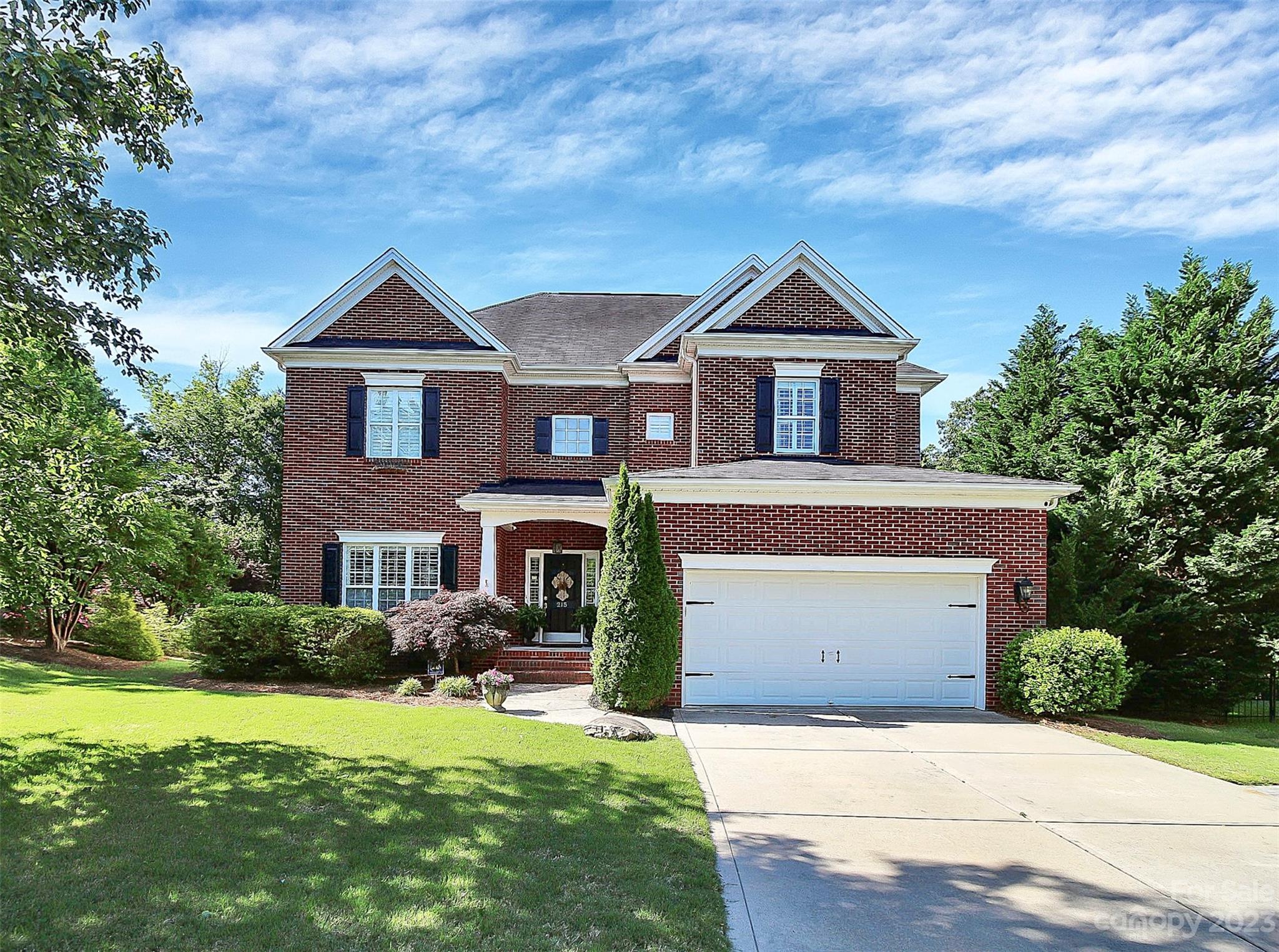 This magnificent five-bedroom home offers the ultimate in luxury and comfort. This home boast beautiful plantation shutters, stunning wood flooring, Crown molding adds an elegant and welcoming atmosphere. The built-ins provide ample storage space for all your belongings, keeping your home organized.

The impressive kitchen island is perfect for entertaining guests on the main floor, which also features a guest suite and full bathroom. Upstairs, there is no lack for space. The hall bath offers double vanity sink providing convenience and functionality for the rooms it shares.  The primary bedroom boasts a stunning en-suite bathroom with a separate shower, soaking tub, walk-in closet, and a peaceful ambiance that invites relaxation. The dreamy backyard is an oasis of tranquility, complete with a private patio and brick outdoor fireplace, perfect for unwinding after a long day. The private cul-de-sac lot offers privacy and serenity, making it the perfect place to call home.