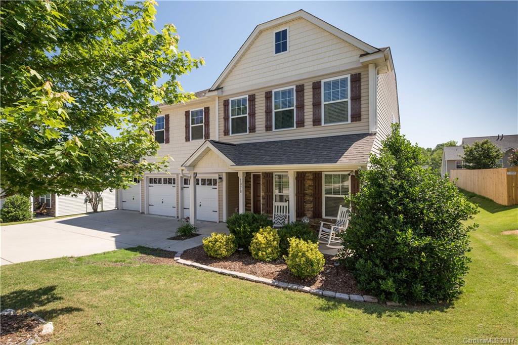 SHOWS LIKE A MODEL! Beautiful 4 bed/2.5 bath has open floor plan, hardwoods throughout the main level, large kitchen w/granite, ss appliances and exposed brick feature wall! The large master has lots of space and a custom built walk in closet. Located right outside of Ballantyne, dining and shopping with county taxes!