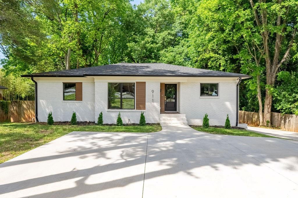 Rare opportunity in prime location! This home delivers the space, style, and location that are becoming increasingly rare near Madison Park. Offering nearly **3,000 square feet of living space** on an expansive **almost half-acre lot**, this home combines elevated design with exceptional functionality.

The main level was built for entertaining, featuring stunning architectural archways, open gathering spaces, and seamless flow throughout. The designer kitchen opens effortlessly into the living and dining areas, creating an inviting atmosphere for both everyday living and hosting. You will love the waterfall quartz kitchen island, custom cabinetry, and accommodating pantry. 

The oversized primary suite is a true retreat with a spa-inspired en-suite bath straight out of a magazine. The custom arched glass doors, stand alone tub, and elegant tile will leave you speechless. With 4 bedrooms and 3 full baths, the layout also includes a private guest suite and secondary living space downstairs—ideal for multi-generational living, guests, or a media room.

Outside, the large driveway and rare two-car garage provide convenience and storage rarely found in this area. Located just moments from Madison Park, walking distance to Park Road Shopping Center and close proximity to South Park. You will notice the luxury redevelopment and renovated homes in the area. 

A rare opportunity to own a design-forward home with this level of square footage, lot size, and garage capacity in one of Charlotte’s most desirable locations!