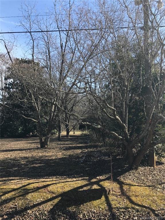 This lots backs up to Meadow Lakes II.  There is an easement at the front of the property that leads back to the lot.