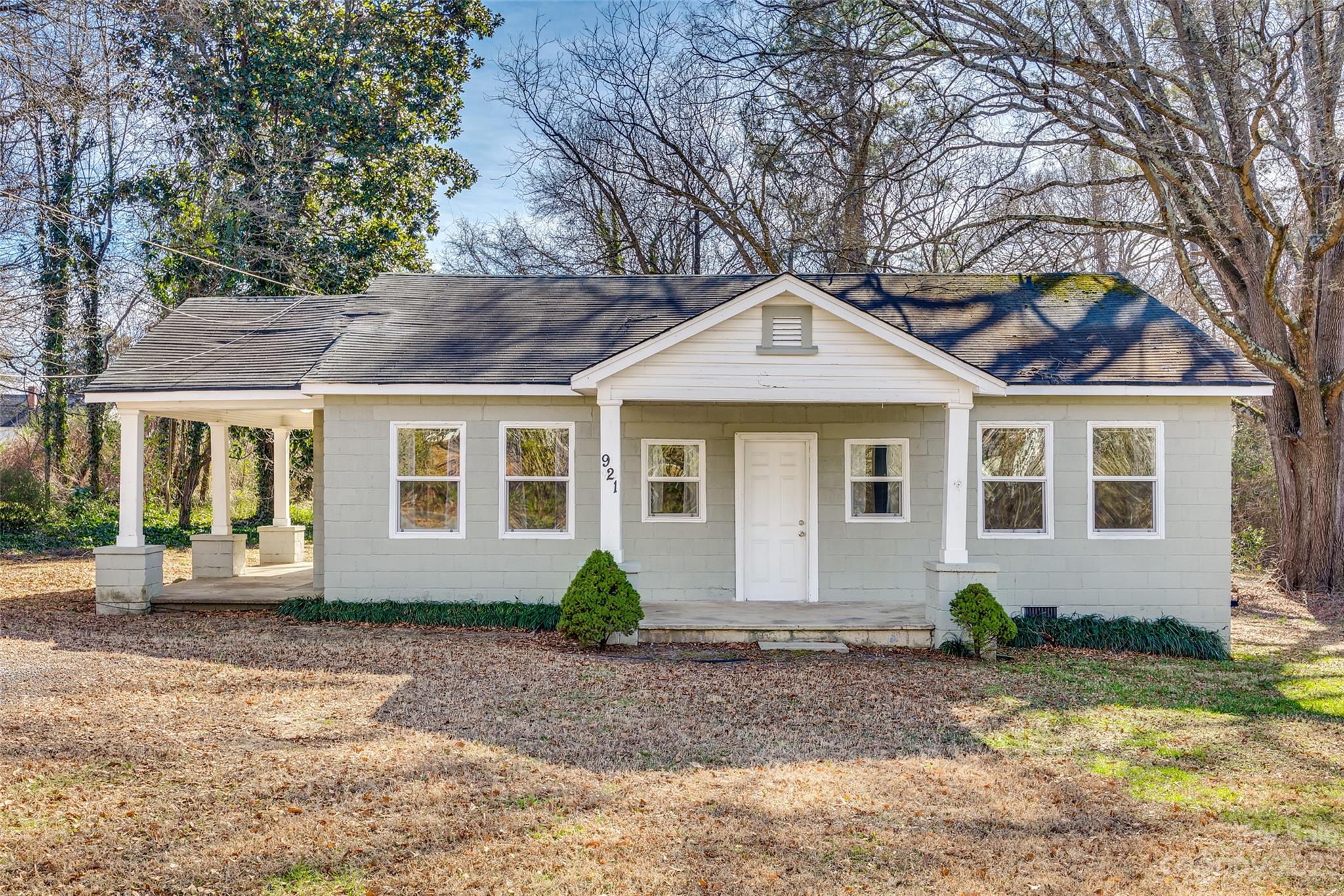 Welcome to this charming 3 bedroom, 2 bathroom home on just over one acre in Gastonia, NC! This well maintained home boasts modern updates, including a new HVAC system, recently updated flooring and electrical systems. The convenience of a new hot water heater and included washer/dryer add to the allure! Step outside and enjoy the 3 porches, all covered and one thoughfully screened for bug-free enjoyment! Situated in close proximity to Lineberger Park, this home offers a blend of natural beauty and recreational opportunities. Enjoy the ease of access to nearby grocery and shopping stores, making errands a breeze.  Don't miss the opportunity to make this home yours. Call me today to set your private tour!