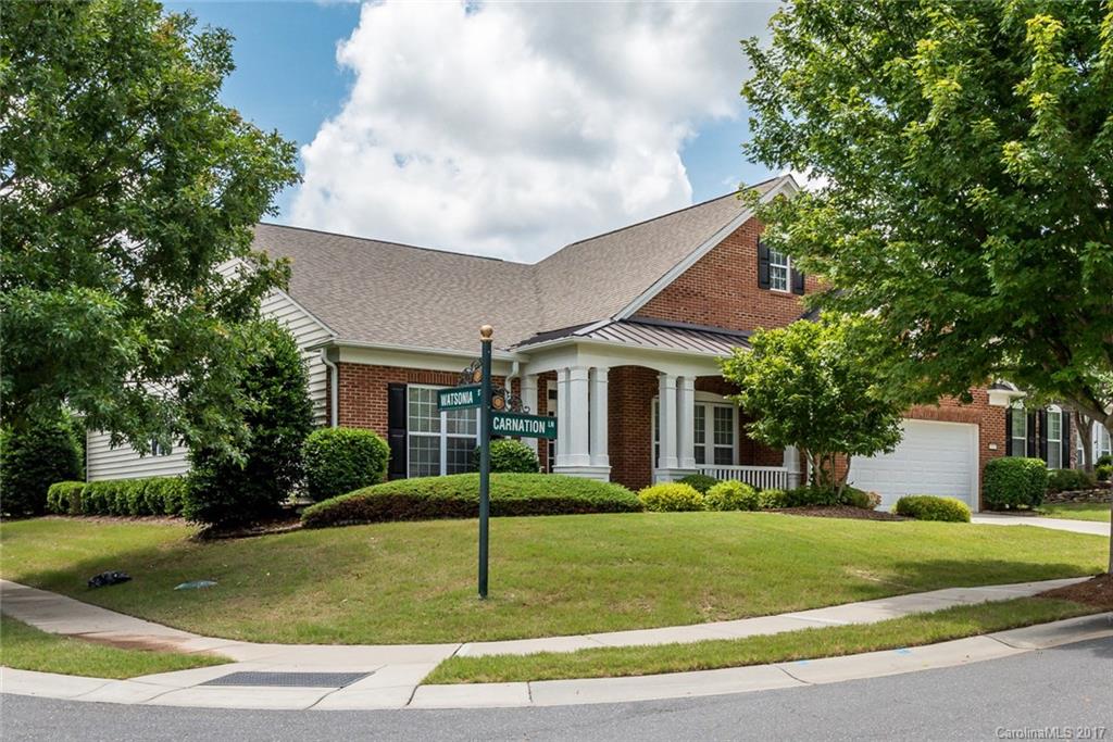 Morningside Lane with sunroom on a corner lot. Foyer opens up to siting Room & formal dining room w/ butler's pantry. Spacious kitchen features stainless steel appliances, granite counters, tile backsplash, maple raised panel cabinetry & island. Great Room is highlighted by gas fireplace w/ granite surround & built-in cabinetry. Rear paver patio w/ electric awning offers plenty of privacy and a serene outdoor setting. Enjoy amenities galore in this 55+ active adult community!