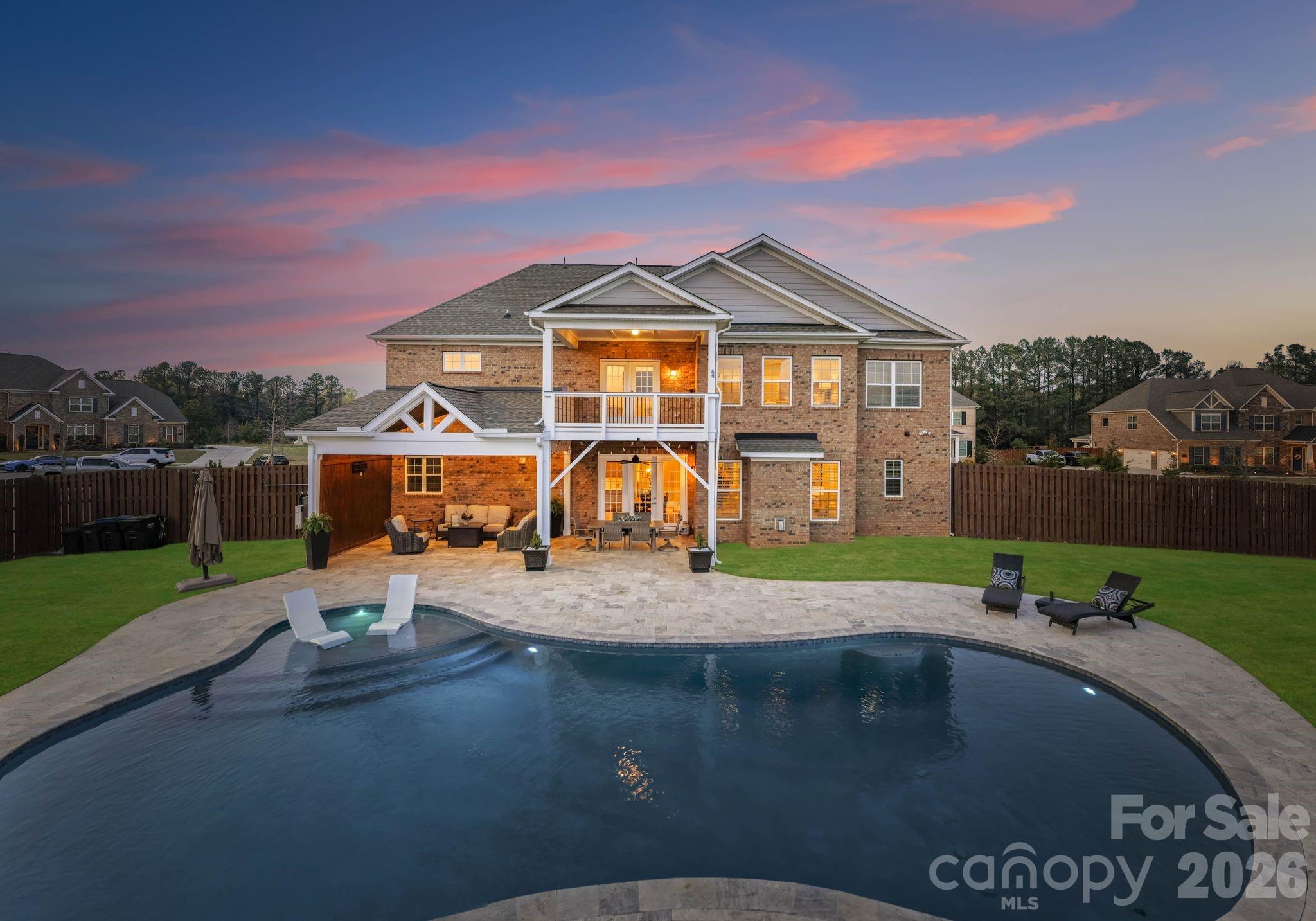 Stop searching-this is the one! From the moment you step inside, this stunning executive home feels just right. Located in the highly sought-after Weddington area, it offers access to top-rated schools, close proximity to shopping and dining, and quick access to interstates for an easier commute. Situated on an expansive lot, the backyard is a true retreat featuring a resort style inground pool with travertine decking and an attached covered patio- a perfect oasis ideal for relaxing or entertaining. The main level showcases a spacious, open concept-kitchen and great room. The kitchen is appointed with stainless steel appliances, an oversized island, and a convenient butler's pantry that connects to the formal dining and living spaces. Upstairs the primary suite offers a peaceful escape, featuring a sitting area, with access to an outside covered balcony- perfect for enjoying your morning coffee or unwinding at the end of your day. Three generously sized secondary bedrooms, each offer access to full baths, providing comfort and privacy for family and guests. A dedicated office/flex space adds versatility, while the spacious bonus room is ideal for a playroom, media room or additional living area. This home has it all, a rare opportunity to enjoy luxury living in one of Union County's most desirable communities. Showings limited to weekends only as sellers work from home.