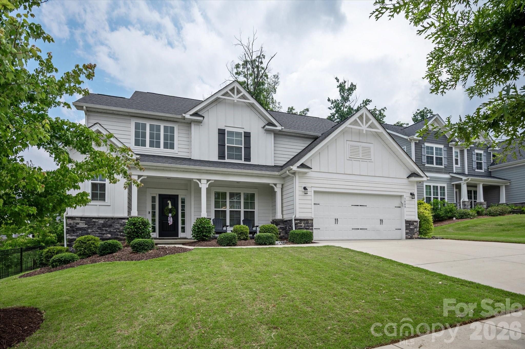Welcome to this storybook-worthy home that blends elegance, warmth, and charm in one of Belmont's most desirable locations. Just moments from Lake Wylie, it offers an exceptional lifestyle surrounded by natural beauty, waterfront dining, nearby marinas, and convenient boat storage for endless days on the water.

Designed with both luxury and functionality in mind, the home features a bright, open-concept floor plan that seamlessly connects living, dining, and gathering spaces—perfect for entertaining family and friends. Thoughtfully designed flex spaces provide versatility to accommodate today's evolving lifestyle, whether you need a home office, fitness room, playroom, or creative retreat.

From the inviting interior spaces to the exceptional flow of the home, every detail has been crafted to enhance comfort and everyday living. Beyond your doorstep, within the community enjoy resort-style amenities including a clubhouse, swimming pool, playground, and scenic walking trails that encourage an active and connected lifestyle. Just outside the community the renowned Daniel Stowe Conservancy, where miles of scenic trails, botanical gardens, waterfront views, and year-round events create an unparalleled outdoor experience. Belmont offers what few communities can—a waterfront opportunity, historic charm, and modern convenience, all wrapped into one extraordinary place to call home.