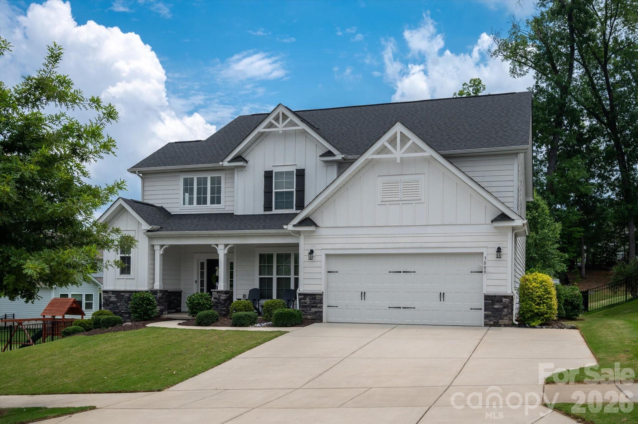 Welcome to this storybook-worthy home that blends elegance, warmth, and charm in one of Belmont's most desirable locations. Just moments from Lake Wylie, it offers an exceptional lifestyle surrounded by natural beauty, waterfront dining, nearby marinas, and convenient boat storage for endless days on the water.

Designed with both luxury and functionality in mind, the home features a bright, open-concept floor plan that seamlessly connects living, dining, and gathering spaces—perfect for entertaining family and friends. Thoughtfully designed flex spaces provide versatility to accommodate today's evolving lifestyle, whether you need a home office, fitness room, playroom, or creative retreat.

From the inviting interior spaces to the exceptional flow of the home, every detail has been crafted to enhance comfort and everyday living. Beyond your doorstep, within the community enjoy resort-style amenities including a clubhouse, swimming pool, playground, and scenic walking trails that encourage an active and connected lifestyle. Just outside the community the renowned Daniel Stowe Conservancy, where miles of scenic trails, botanical gardens, waterfront views, and year-round events create an unparalleled outdoor experience. Belmont offers what few communities can—a waterfront opportunity, historic charm, and modern convenience, all wrapped into one extraordinary place to call home.