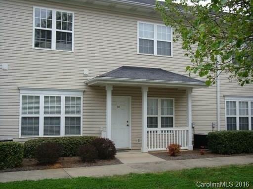 New carpet and fresh paint throughout. Desirable location in Davidson. Home features 2 master suites both with full baths, all appliances included (washer & dryer as is condition), gas fireplace with built in TV niche, breakfast bar overlooking dining area. Must See!