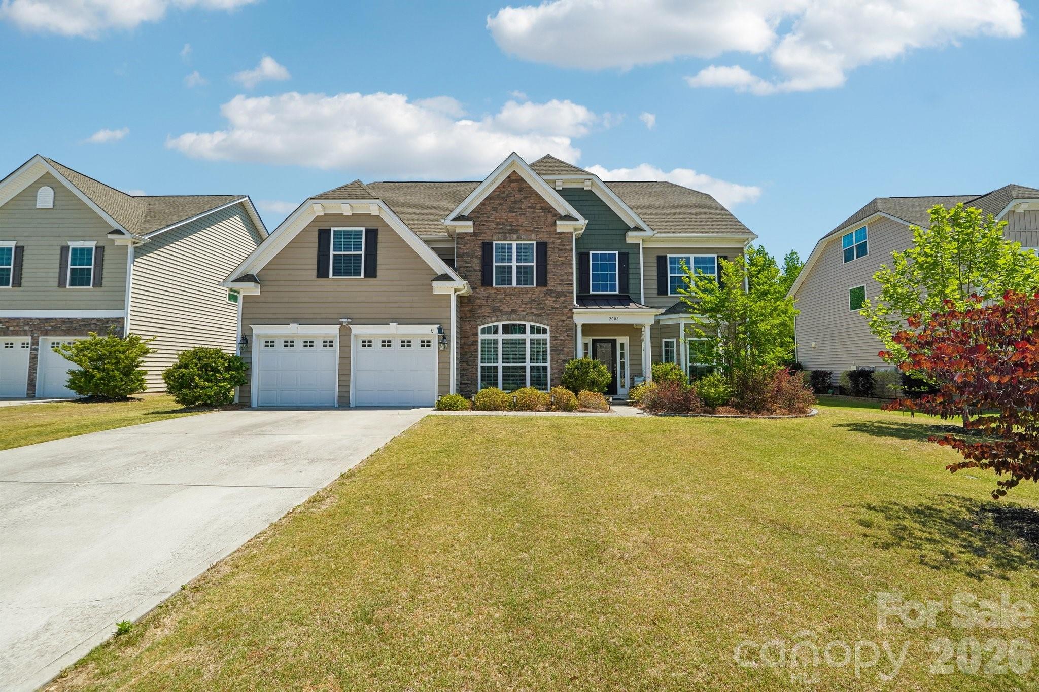 You've got to check out this spacious 5-bedroom, 3.5 bath home offering close to 3500 square foot of living space in the highly desirable Davidson area! This beautifully designed two-story home welcomes you with a grand glass front door and impressive two-story foyer, complemented by both front and rear staircases for added elegance and functionality.

The main level features a large office off entrance hallway with floor to ceiling windows. The chef’s kitchen is a true centerpiece, showcasing a gas oven, built-in microwave, over-sized granite island, staggered cabinetry with crown molding, stylish tile back splash, pendant lighting, and rich hardwood floors. Extensive hardwoods throughout the first floor add warmth and sophistication.

Upstairs, the spacious primary suite offers a luxurious retreat with dual vanities, tile flooring, and a spa-like bath featuring a separate soaking tub and tiled shower. All bathrooms are upgraded with granite counter-tops for a cohesive, high-end finish. Large flat, fenced in backyard great for entertaining.   The yard backs up to a private, wooded area offering nice privacy.

The seller purchased solar panels and owns them free and clear.   They convey with the sale of the home, certain additional furnishings and electronics can be conveyed upon agreement.  Garage features additional upper storage racks.  Enjoy having much lower energy bills as a BONUS for buying this home! Just 15 minutes to access I-85, I-77, I-485 and Concord Mills Mall!