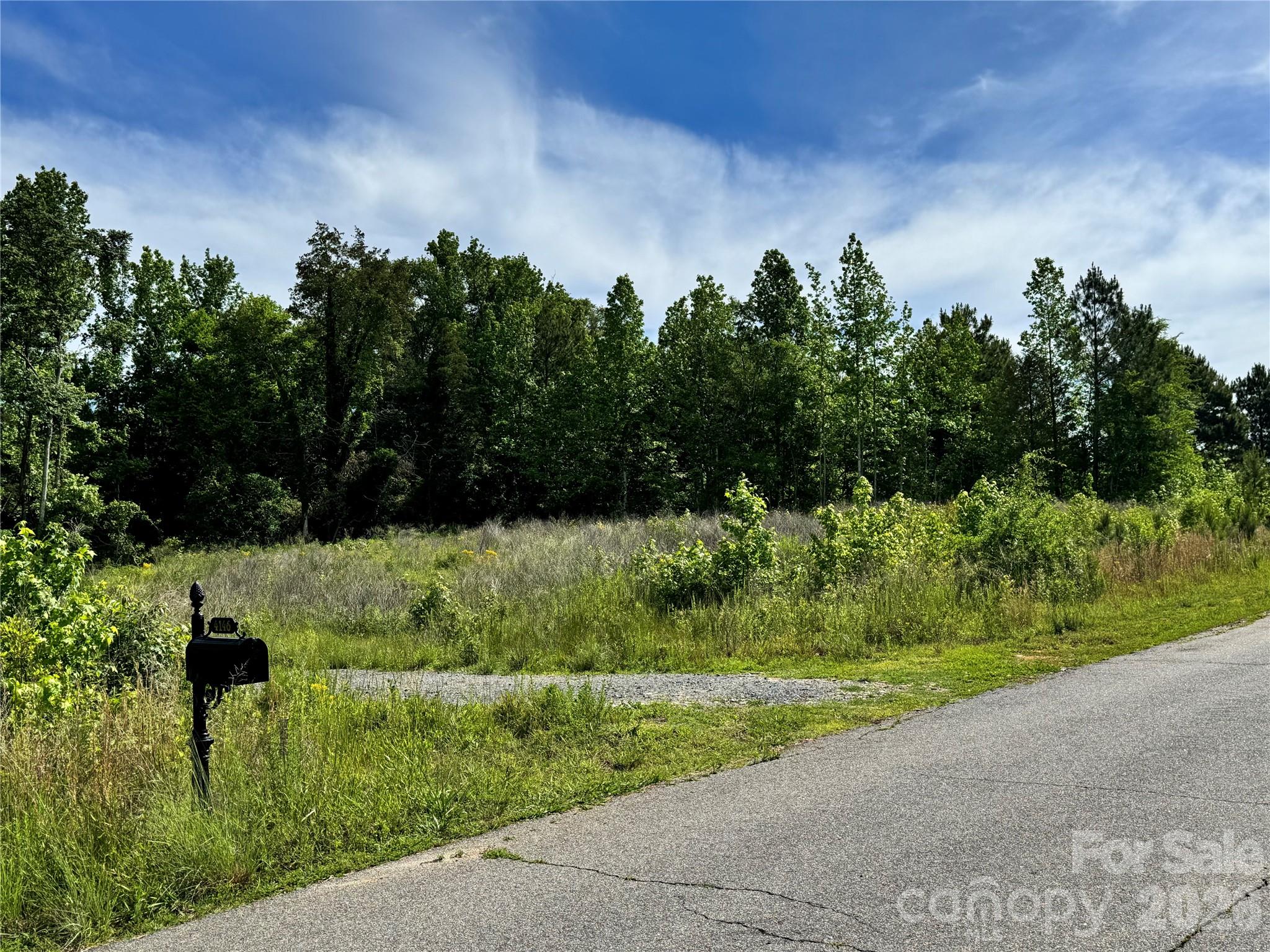 Here is your opportunity to transform your dreams into a reality; to build your future residence on this lovely 3.33-acre lot in an established and sought after community - The Gates at Eastview! The seller is offering two lots together --- can create an amazing place to call home. The well is installed to accommodate up to a 7-bedroom home, there is also a 50-amp RV hookup plus a cozy fire pit & stream! Are you intrigued? This acreage can accommodate a slab or crawlspace with a minimum build of 2,200 sq ft for a ranch home and a minimum of 2,300 sq ft for a multi-level home plus minimum 2-car attached garage. With the community guidelines in place the community home values and your investment are more protected. Bring your builder and start planning today!