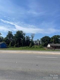 Highly Visible location on Wilkinson Blvd, Zoning H-C, Use Type COM-NEC, Located very close to the intersection of Wilkinson Blvd and Park St. 4th property from Walgreens, Close to downtown Belmont, Vacant lot in between 2 motels,
Buyer responsible for verifying Zoning, Water, Sewer and Building guidelines/permitting,
6828 W Wilkinson Blvd fronts Wilkinson PID 186281,
Adjoining lot Brewer St PID 186293,