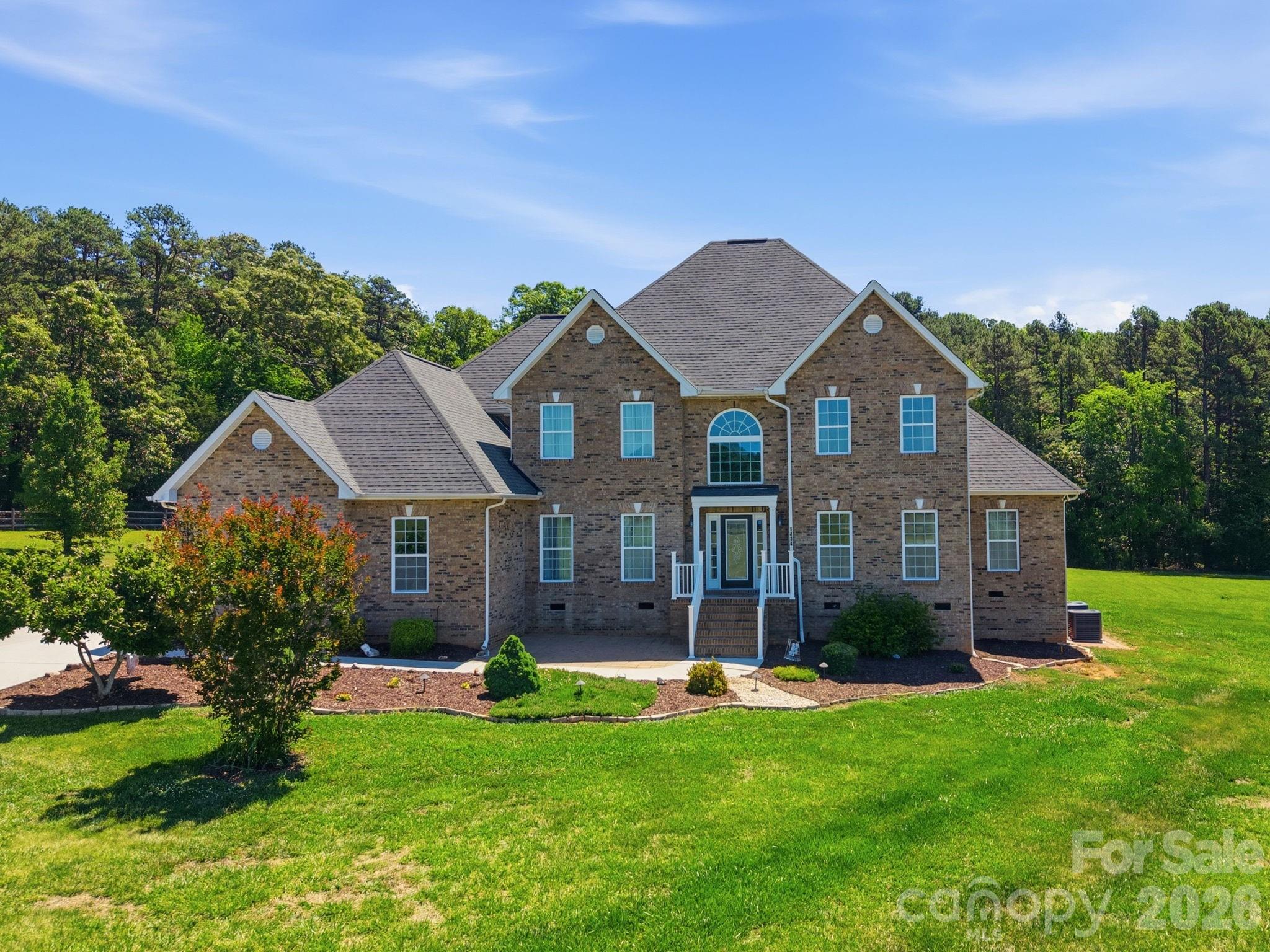Welcome to 1434 Steeplechase Dr. located within the GATED community of Saratoga. This home is the perfect blend of modern living and breathtaking views on a peaceful 10-acre sanctuary. When coming up the driveway, take in the surrounding beauty while experiencing your first look at this stately home. The secluded panoramic setting will immediately transcend you from day-to-day busyness to a luxurious hidden escape. As you enter the home, a soaring 2-story ceiling accents your Foyer along with the elegant polished tile flooring! It's a majestic area for greeting family and friends! Turning to the right, the Flex Room with French Doors is perfect as a Home Office or a Guest Lounge with relaxing chairs for unwinding! Prepare to be WOW'd by the 2-Story Great Room where the stone fireplace will capture your focus with its dramatic contrast and cozy, inviting ambiance! Look up, the upstairs railing is stunning and serves as an architectural focal point within this home! The Great Room opens to your Kitchen which offers warm cabinetry tones and a luminous granite that is both classy and timeless! The island is definitely the unofficial heart of your home as everyone loves to gather around it! When it's time to turn in for the evening, the Owners Retreat is on the MAIN level and provides ultimate comfort and accessibility along with an en suite bathroom. Plus, you have your own private covered porch to relax on and gaze out at your captivating property - notice the apple, peach and pear trees in the near distance! There are also 4 generously sized Guest Bedrooms upstairs. Two of the Bedrooms have en suite access to a dual Bathroom! Enjoy the great outdoors with family and friends on your oversized patio! Go ahead, share funny stories and laugh out loud - you are surrounded by nature and an impressive 10-acre property! Notable Extras: The plush carpeting is brand new in all carpeted areas (except in the Recreation/Game Room). Tankless Water Heater. Partially fenced area. Enormous Walk-In Attic storage. This incredible home can be yours!