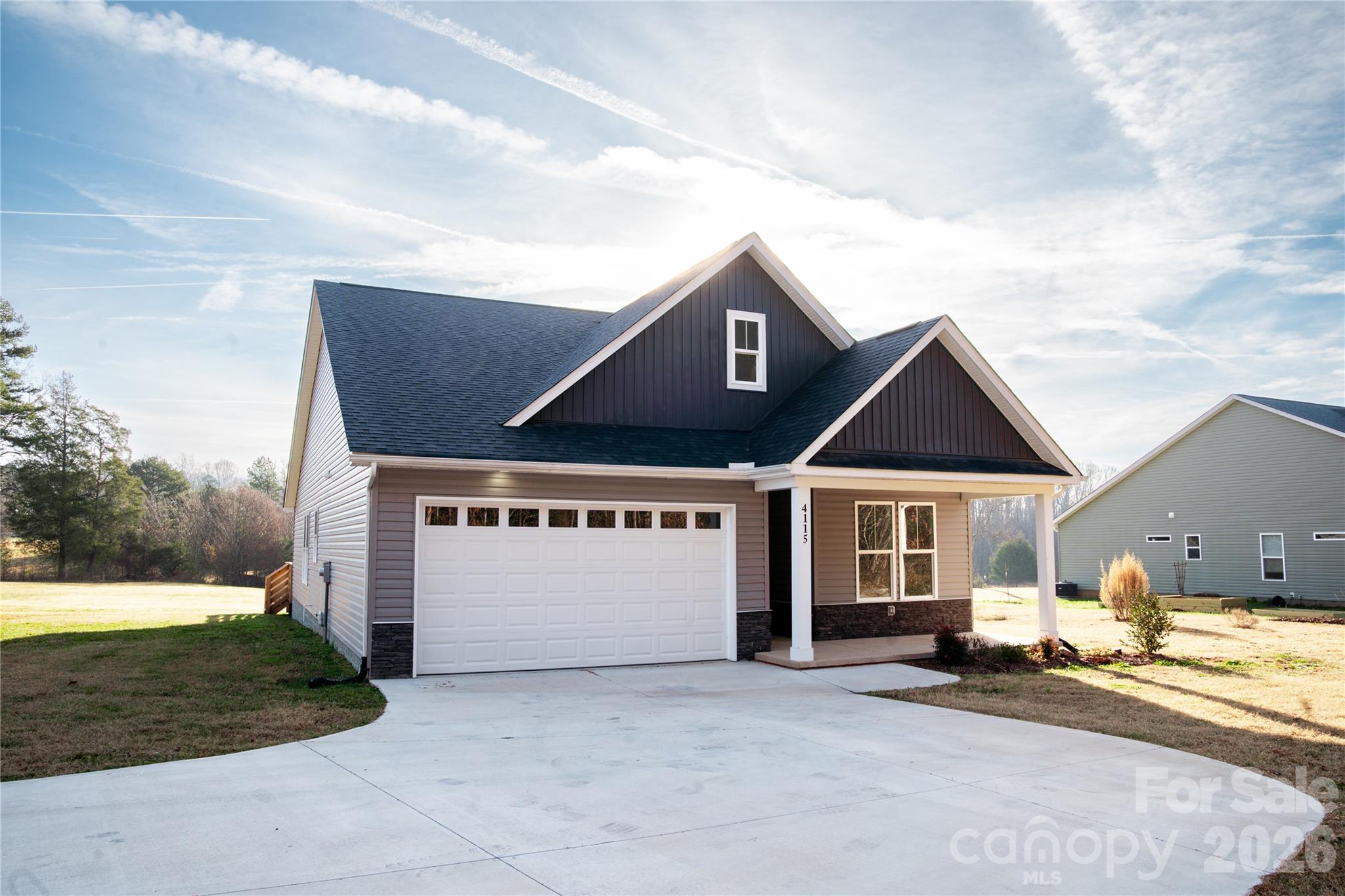 Welcome to this modern home set on a beautiful one-acre lot, offering the perfect blend of modern comfort and countryside charm. Surrounded by open space and scenic views, this property provides a peaceful, farm-like atmosphere while still being within convenient reach of town amenities.

Step inside to discover a thoughtfully designed interior featuring contemporary finishes, an open and inviting layout, and abundant natural light throughout. The cozy landing zone gives you a space to land as you enjoy your new home. The spacious living areas flow seamlessly, making the home ideal for both everyday living and entertaining. Being built in 2024, this house is almost a new build home that makes the perfect place to call home.

Outside, the expansive acre offers endless possibilities such as gardening, outdoor gatherings, recreational space, or simply enjoying the quiet and fresh air. This property delivers the space and freedom to make it your own.

This is a rare opportunity to own an almost brand-new home in a serene, rural setting where peaceful living meets modern convenience.

There is an easement with this property. Please review the attached documents.