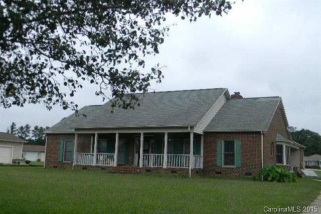 Brick ranch with open design.  Repairs are needed but this is a 1 acre lot in a great country setting.