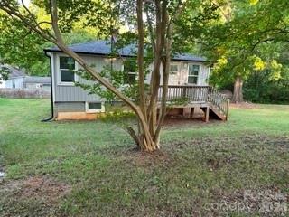 This is a unique property ready for someone to come in and make it their own.  This home does needs some finishing touches like flooring and other items.  This is not for the weekend warrior.  Now for my investors this is great for my short term rental and my rental.  There is even an opportunity to build a ADU beside the home.  It has its own address and parcel ID. Let's talk about options on this property.  This is a one level home with a partially finished basement.  Upstairs you have 2 bedrooms 2 full bathrooms, living room and a eat in kitchen.  The lower level has a mini kitchen to be finished, a laundry room with storage options, full bath with deep soaking tub, a living space, open area , bedroom with closet and its own entrance.  This is one of a kind on a budget.  This home needs work.  Great for those DIY with some options, investors looking to rent and those who like a challenge. This home needs to be finished in order to occupy. IT IS NOT LIVABLE!!!!