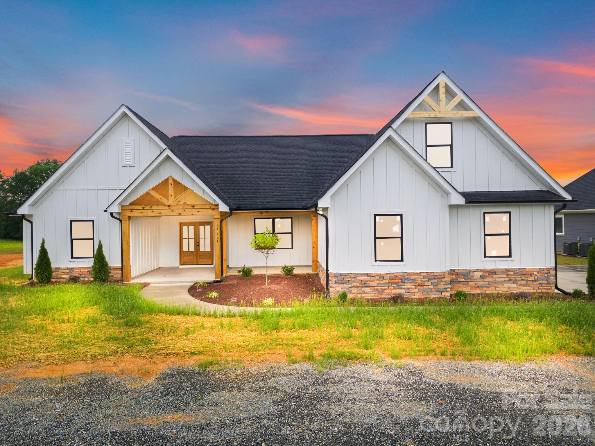 Luxury New Construction on 1.17 Acres – Modern Comfort Meets Timeless Design
Welcome to this stunning new construction home situated on a spacious 1.17-acre homesite, offering the perfect blend of privacy, quality craftsmanship, and modern living. Featuring 4 bedrooms, 3.5 bathrooms, and thoughtfully selected finishes throughout, this home is designed to impress.Step inside to discover soaring 10-foot ceilings, custom trim details, and an open-concept floor plan ideal for both entertaining and everyday living. The spacious family room is anchored by a beautiful fireplace and flows seamlessly into the gourmet kitchen, complete with quartz countertops, custom cabinetry, a large center island, and ample workspace for cooking and gathering.The main-level primary suite serves as a private retreat with a luxurious spa-inspired bath and an oversized walk-in closet. Three additional bedrooms and well-appointed bathrooms provide plenty of space for family, guests, or a home office.Enjoy relaxing mornings on the covered front porch and unwind in the evenings on the covered rear porch overlooking the generous backyard. A custom front entry door and side-load two-car garage add to the home's exceptional curb appeal.Located just minutes from downtown Locust and only a short drive to Charlotte, this beautiful property offers the perfect combination of peaceful surroundings and convenient access to shopping, dining, schools, and major highways.