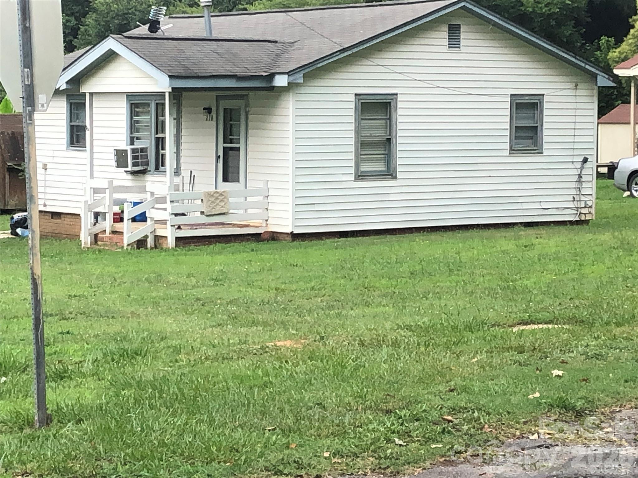 Good location across the street from Fort Mill High School.  House has been freshly painted inside. LVT flooring in kitchen and living room. Roof replaced in 2024. Mini split heating and cooling system in 2025. Also, an additional septic system on lot for possible building a site home or manufacture home but no mobile home.  Almost an acre lot.  Lot cannot be subdivided.  Sold as is.