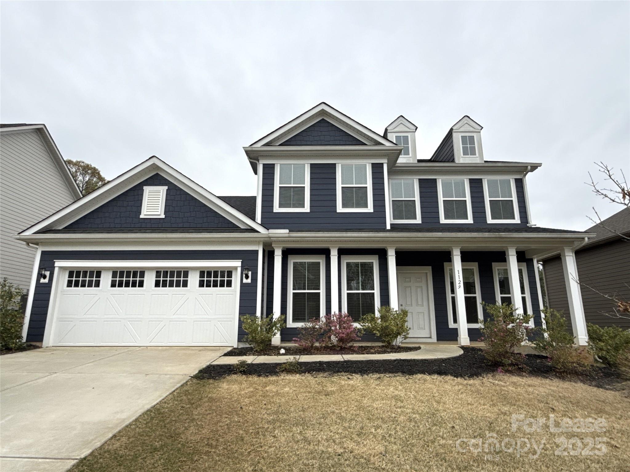 Fantastic 5-bedroom house in Fort Mill. Open concept floor plan. Chef style kitchen. Office space with built-in desk off the kitchen with storage and great lighting. Gorgeous floors throughout the main level. Carpet in the living room with accent fireplace. Flex room space with french door entry on the main level. All bedrooms located on the upper level. Grand primary bedroom with dual vanity sinks in bath and glass oversized standing shower with bench seat. Private parking in an oversized 2-car garage. Mud room with storage off the garage entry. Washer and Dryer included. Come see this home today!  Renter's Insurance is required. One small dog only, under 30 lbs.
