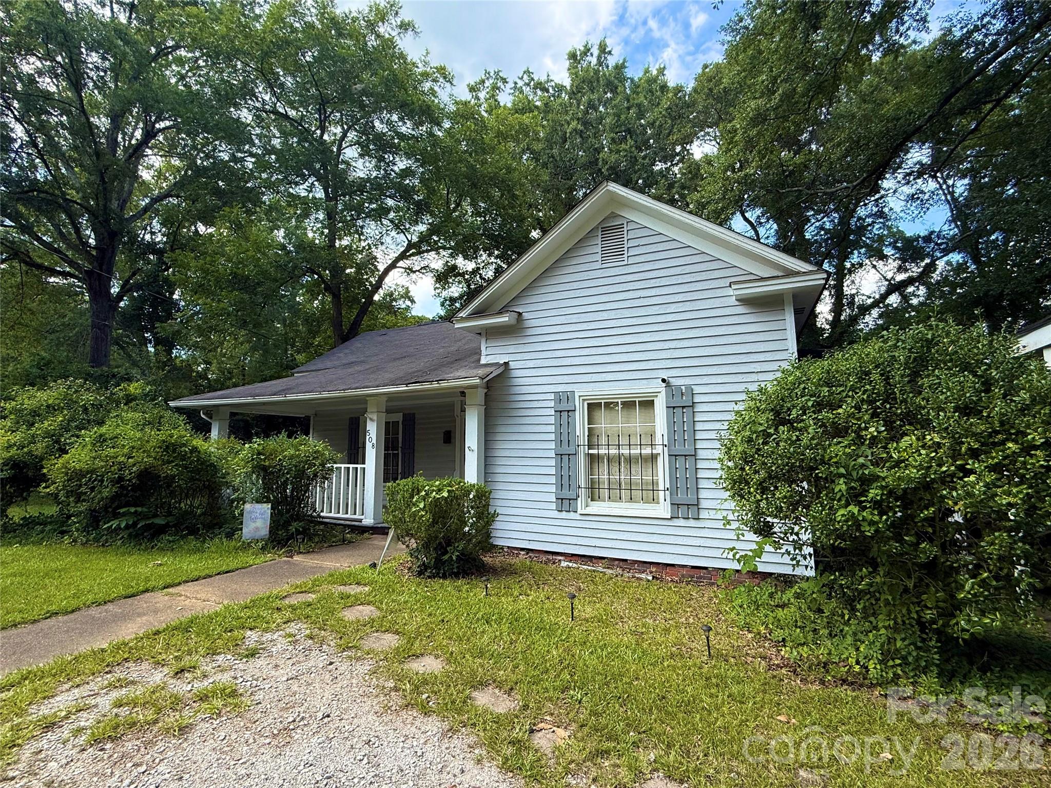 Investor Alert!!! If Lancaster, SC is calling your name. . You definitely need to check out this opportunity priced under market value.  Huge potential to fix and flip. Large corner lot in the city of Lancaster with water and sewer connected.  Detached 3 car garage with water hookup and electric.  The home itself needs work and seller will make no repairs.  The home is priced accordingly.