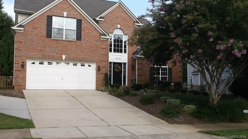 Immaculate home! New plank wood floors throughout. Ceramic tile in bathrooms. Custom Hickory vanity & copper sink in half bath. Large open kitchen w/Corian countertops, SS appliances, custom tile backsplash & custom stone accent on front of island. 2 sty greatroom, arched doorways. Master on main level w/deluxe master bath. 5 bdrm, 3 full bath. Bdrm #3 upstairs has private full bath. Tons of storage. Fantastic screened in porch & deck overlooks private bkyd. Visitor docks provide access to lake.