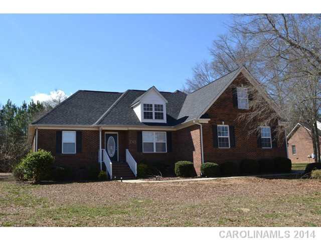 Beautiful, mostly brick home with all living space on main level except for 4th bedroom or bonus upstairs with a full bath.  Formal dining room has tray ceiling, vaulted great room with fireplace/gas logs!  Split bedroom plan.  Awesome sun room with tons of windows to watch mother nature!  Fenced patio area, double garage and wired workshop!  Convenient to I-77! 24 hour notice required.