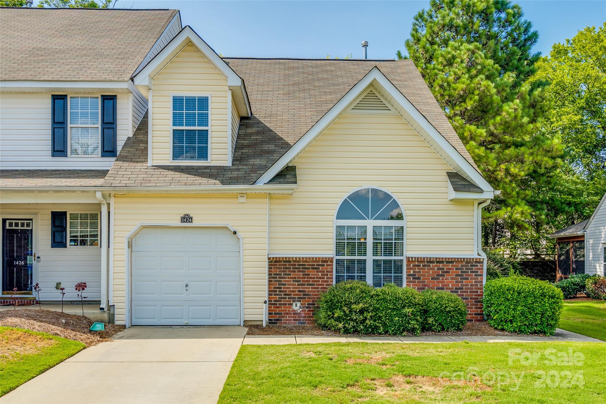Rates have dropped! Take a look at this townhouse in Lexington Commons! Not only is the primary on the main, it's an end unit and it has a garage! Beautiful new LVP floors in the main areas, stainless steel appliances and granite countertops in the kitchen. HVAC and furnace replaced in 2023. New hot water heater 2022. Convenient to I-77, shopping and grocery stores close by.