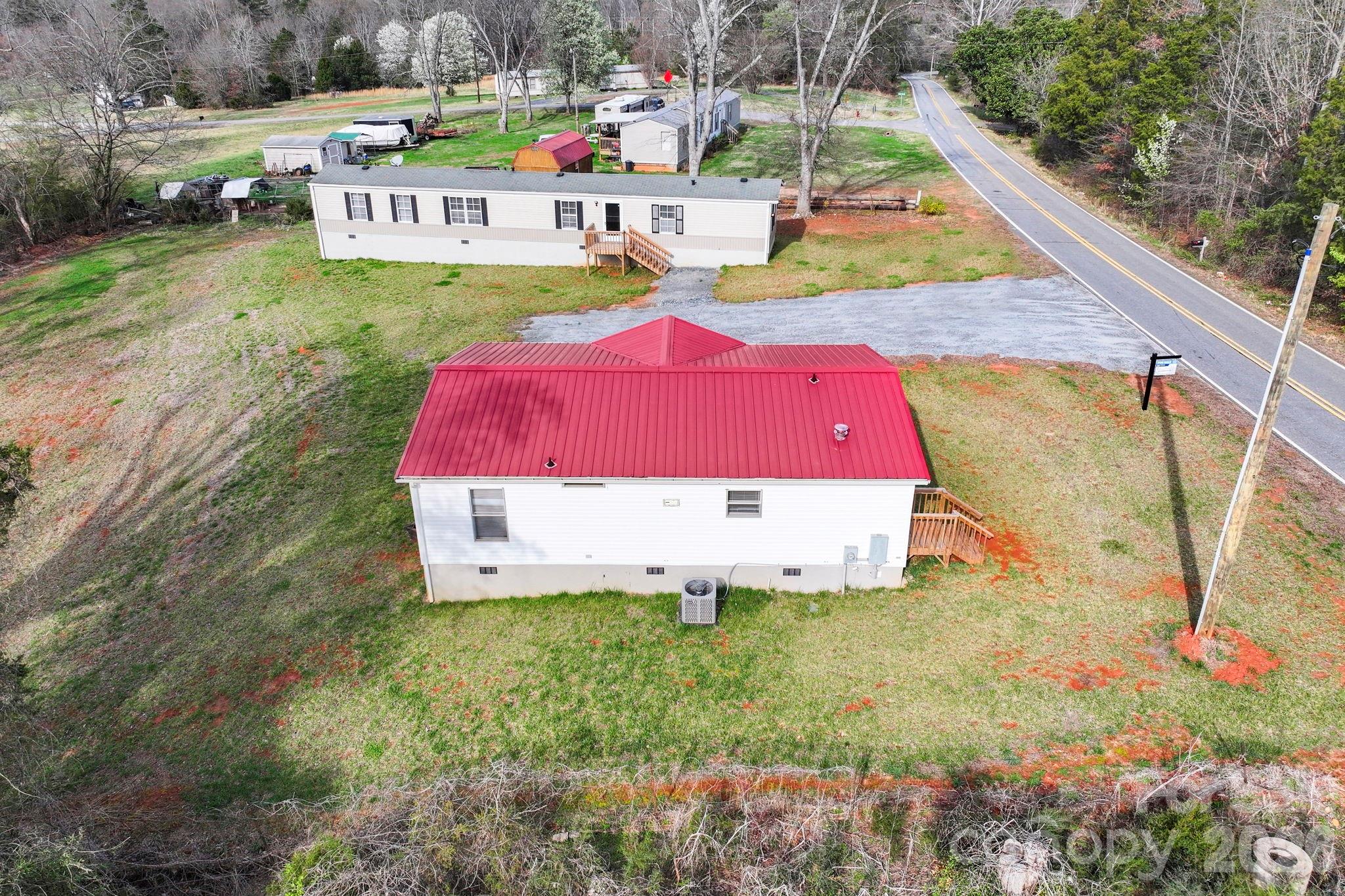 Investment opportunity near downtown Forest City! This unique property features two homes on one parcel, making it an excellent option for investors, rental income, or multi-generational living.

The property includes one single-wide and one double-wide home, both in excellent condition after being recently renovated. Each home offers 2 bedrooms, 2 bathrooms, plus a bonus room that can be used as a home office, guest room, hobby space, or additional sleeping area. With flexible layouts and move-in ready condition, these homes are ideal for long-term tenants, short-term rental potential, or owner-occupied living with additional income.

Buyers will appreciate the peaceful rural setting while still being only about 5 minutes from downtown Forest City, providing quick access to shopping, restaurants, grocery stores, and everyday conveniences.

Whether you’re searching for a dual-living property, investment property with two rental units, or a home with built-in income potential, this property offers flexibility and value in a convenient location.