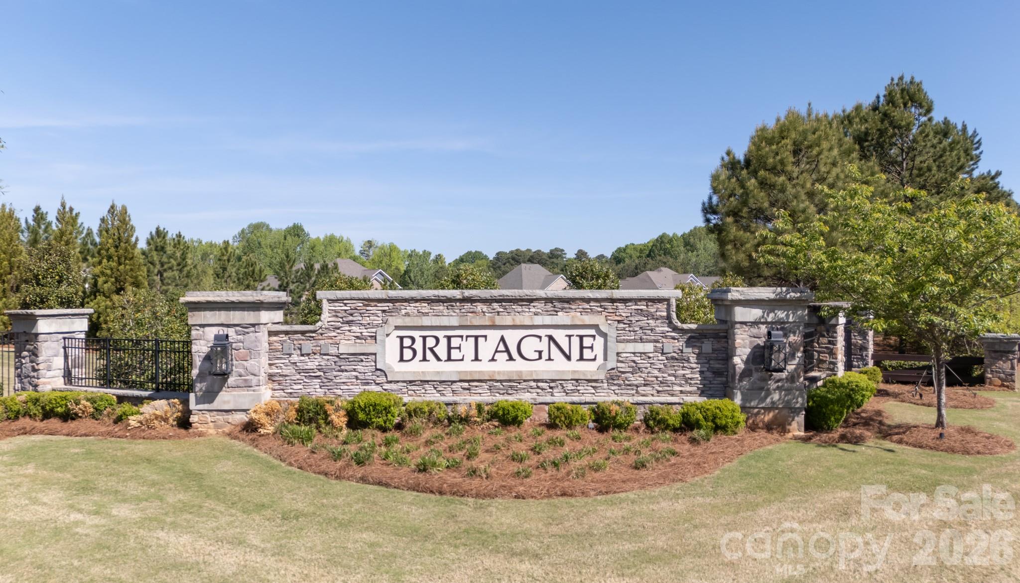 Gated community in sought after Bretagne subdivision!  Highly rated schools, lower SC property taxes, and convenient to Ballantyne and The Bowl for shopping, restaurants, and entertainment with quick access to I-485 for the airport.  Gorgeous Craftsman style home backing to mature, tall woods for privacy!  This home is well maintained and ready to be loved by its next owner.  Bretagne subdivision is a beautiful, privately gated community with lots of amenities to enjoy.  This stately home has a good spaced, flat backyard for games and grilling.  Home has a rocking chair front porch to sit and visit with friends and neighbors.  The open floor plan has plenty of room for entertaining in the large kitchen, studying or working in the flex/office space, or snuggling down to watch the game in the huge great room with the warm and cozy fireplace.  Kitchen has white cabinets with stainless steel appliances, granite counter tops and a big island.  Guest bedroom with a full bathroom on the main level allows privacy from the rest of the bedrooms.  Upstairs has additional three secondary bedrooms, full bathroom, laundry room, and loft area.  In addition to the secondary bedrooms, the upstairs primary bedroom has a large walk-in closet, tray ceiling, primary bathroom with dual vanity sinks, stand up shower, and soaking tub for relaxing spa bubble baths.  Subdivision has a large outdoor pool, clubhouse, playground, and volleyball net with a sand field and the subdivision even has street lights and  sidewalks for walking with friends.  This home has low SC property taxes to leave you with more funds in your pocket for fun excursions.  Carpets have been professionally cleaned and home has been deep cleaned, ready to move in.  2025 estimated property taxes could be $4,293 for an owner occupant with SC Homestead residency verification with the county assessor.  For your 3D tour, copy and paste:  https://my.matterport.com/show/?m=Wa74urYUnXv&mls=1