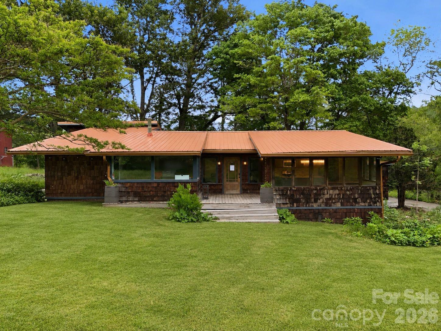 250 Potato Branch Rd offers the perfect blend of privacy, space, and breathtaking mountain scenery! Nestled on 18 beautiful acres, this unique property features a spacious 3-bedroom, 2-bath layout with 2,552 sq ft of living space designed for comfort and versatility. Enjoy stunning mountain views from your own slice of paradise while taking advantage of the barn, ideal for hobbies, storage, or animals. Inside, you’ll find a dedicated office plus an additional flex room perfect for a guest space, gym, playroom, or whatever fits your lifestyle. With plenty of room to roam both inside and out, this property is a rare opportunity to enjoy peaceful country living with endless possibilities.