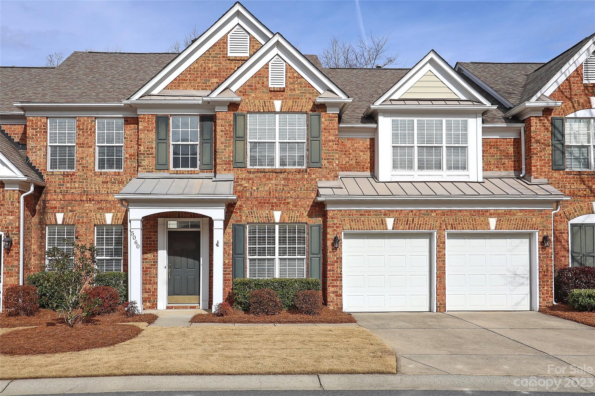 Welcome to this very open & radiant TH with Primary Bedroom on main floor! Located in the sought after Amherst Green community, the open floorplan is complimented by large windows flooding the home with natural light. Prefinished hardwood flooring on main floor living areas adds to the beauty. Living & Dining Rooms are intimate in size & filled with light. Great Room has a 2 story ceiling, gas fireplace & opens to a spacious private Patio enclosed w/ TimberTech low maintenance fencing. Kitchen includes double ovens, ample storage & a large Island offering a nice gathering space. Primary Bedroom features neutral carpeting, tray ceiling & a large window overlooking Patio. Primary Bath features a walk-in shower, a Garden tub, dual vanities & a large walk-in closet. 2nd level features 2 spacious bedrooms w/ large closets, full bath w/ dual vanities, a large loft area & Flex Space Room. Blinds are throughout the home. Walk-In Attic Upstairs. Home includes a Pentair water filtration system!