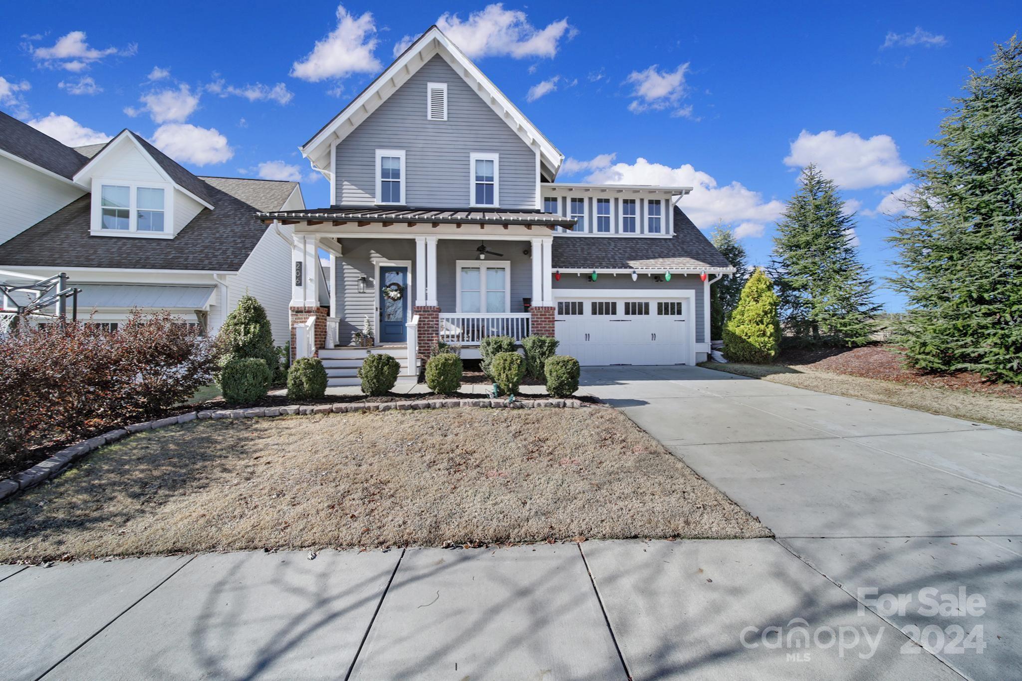 Amazing opportunity to own this immaculate, award winning, Saussy Burbank former model home in Masons Bend. This contemporary farmhouse features a primary down floor plan with a high level of custom finishes throughout  including chevron shiplap, custom open shelving in kitchen, knotty pine ceiling in study, custom built-ins, coffered ceiling, speakers & more. Spacious gourmet kitchen with large island that opens to the main living area, perfect for indoor entertaining. On the second floor you’ll find 3 generously sized bedrooms & a great loft space for everyone to enjoy. Outside, a beautiful rocking chair front porch greets you & a rear covered deck & extended paver patio are ideal areas to relax while enjoying the gorgeous backyard. Home is adjacent to one of the many pocket parks in the neighborhood. Community features include a beautiful clubhouse with two pools & fitness center overlooking the Catawba River, walking trails, river access & zoned for award winning Fort Mill Schools.