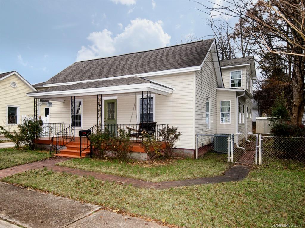Welcome Home!  Price reduction! USDA 100% financing available. Home Warranty in place. Transferable Termite Bond. Two large Master Bedrooms, Two large Walk-In Closets. Master on Main. Mud Room, Laundry Room and Attached Garage. Second bedroom on Main may be used as a Study or Office. Gorgeous Virginia Hand Scraped Hardwood Flooring, On Demand Hot Water System, Extra large 4 inch Concrete Parking Pad. Bear Claw Tub. Award winning Fort Mill Schools. Charming and Quaint.
