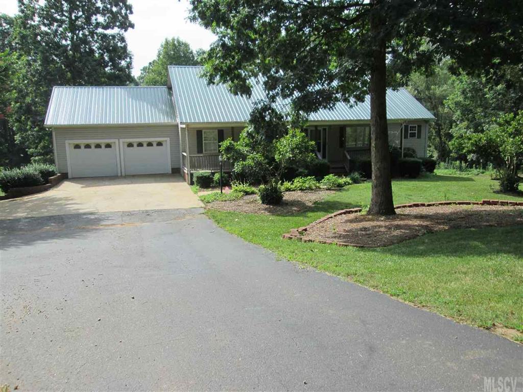 Nice home on 9.35 mostly cleared acres with vaulted ceiling and hardwood floors on the entire main level.  Full finished basement with gas log fireplace.  Large screened in covered deck off the kitchen and screened porch off of the den in the basement, leading to the in-ground pool.  Large room size pantry.  Creek on property with swimming hole that has been dug out.