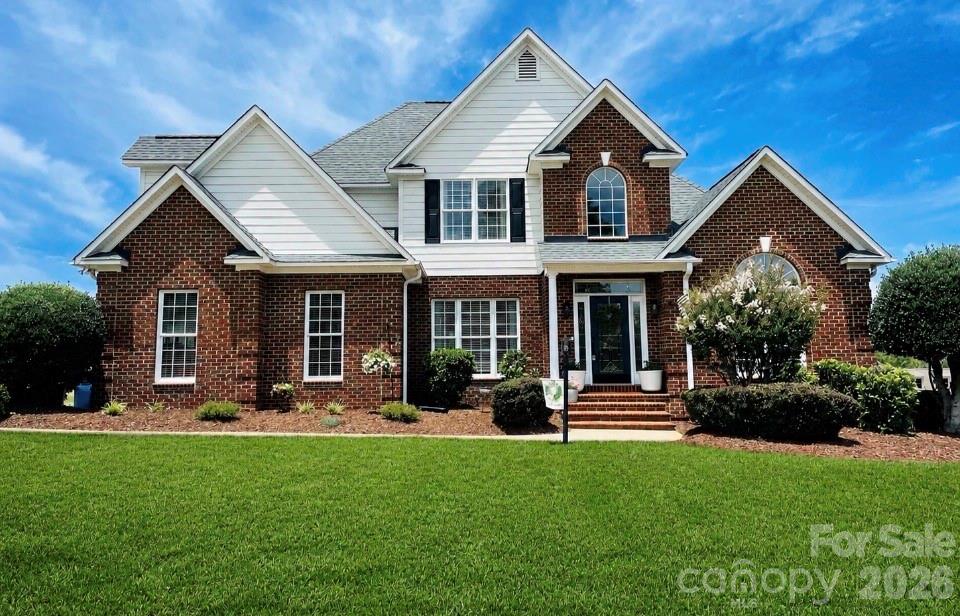 Come see this stunning custom-built home perfectly situated on the 7th hole of the Deer Brook golf course community. The home boosts a beautiful entry with natural light, this exceptional home showcases beautiful hardwood floors, an open and inviting floor plan, and quality craftsmanship throughout that feels like a new built home. A spacious living area features cozy gas logs and flows seamlessly into the heart of the home, creating the perfect space for entertaining and everyday living. The luxurious primary suite offers a stunning ensuite bath designed for comfort and relaxation, goregous tilework and a soaking tub. Upstairs, you’ll find generously sized bedrooms or one the can be used as a bonus room, including one that offers a private ensuite, providing ample space for family and guests. A kitchen that allows for plenty of prep space, coffee bar, eat in breakfast area with upgraded stainless appliances that includes a 5-burner gas cooktop. Additional highlights include a central vacuum system, extensive storage throughout, and picturesque golf course views. Enjoy evenings on the back deck or patio overlooking the lush green course. This remarkable home offers elegance and an unbeatable location on a .53 lot for the ultimate lifestyle experience.