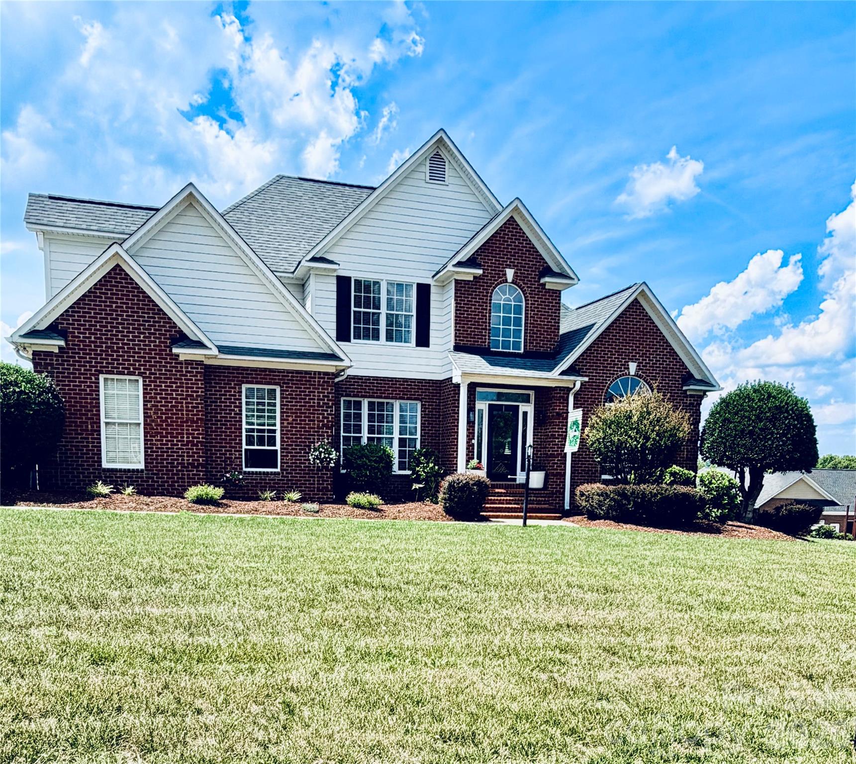 Come see this stunning custom-built home perfectly situated on the 7th hole of the Deer Brook golf course community. The home boosts a beautiful entry with natural light, this exceptional home showcases beautiful hardwood floors, an open and inviting floor plan, and quality craftsmanship throughout that feels like a new built home. A spacious living area features cozy gas logs and flows seamlessly into the heart of the home, creating the perfect space for entertaining and everyday living. The luxurious primary suite offers a stunning ensuite bath designed for comfort and relaxation, goregous tilework and a soaking tub. Upstairs, you’ll find three generously sized bedrooms, including one that offers a private ensuite, providing ample space for family and guests. A kitchen that allows for plenty of prep space, coffee bar, eat in breakfast area with upgraded stainless appliances that includes a 5-burner gas cooktop. Additional highlights include a central vacuum system, extensive storage throughout, and picturesque golf course views. Enjoy evenings on the back deck or patio overlooking the lush green course. This remarkable home offers elegance and an unbeatable location on a .53 lot for the ultimate lifestyle experience.